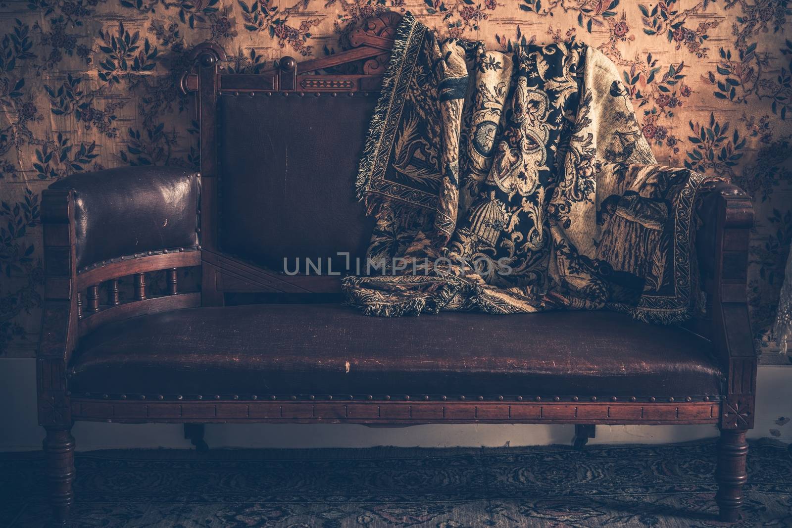 Vintage Leather Sofa with Vintage Blanket.