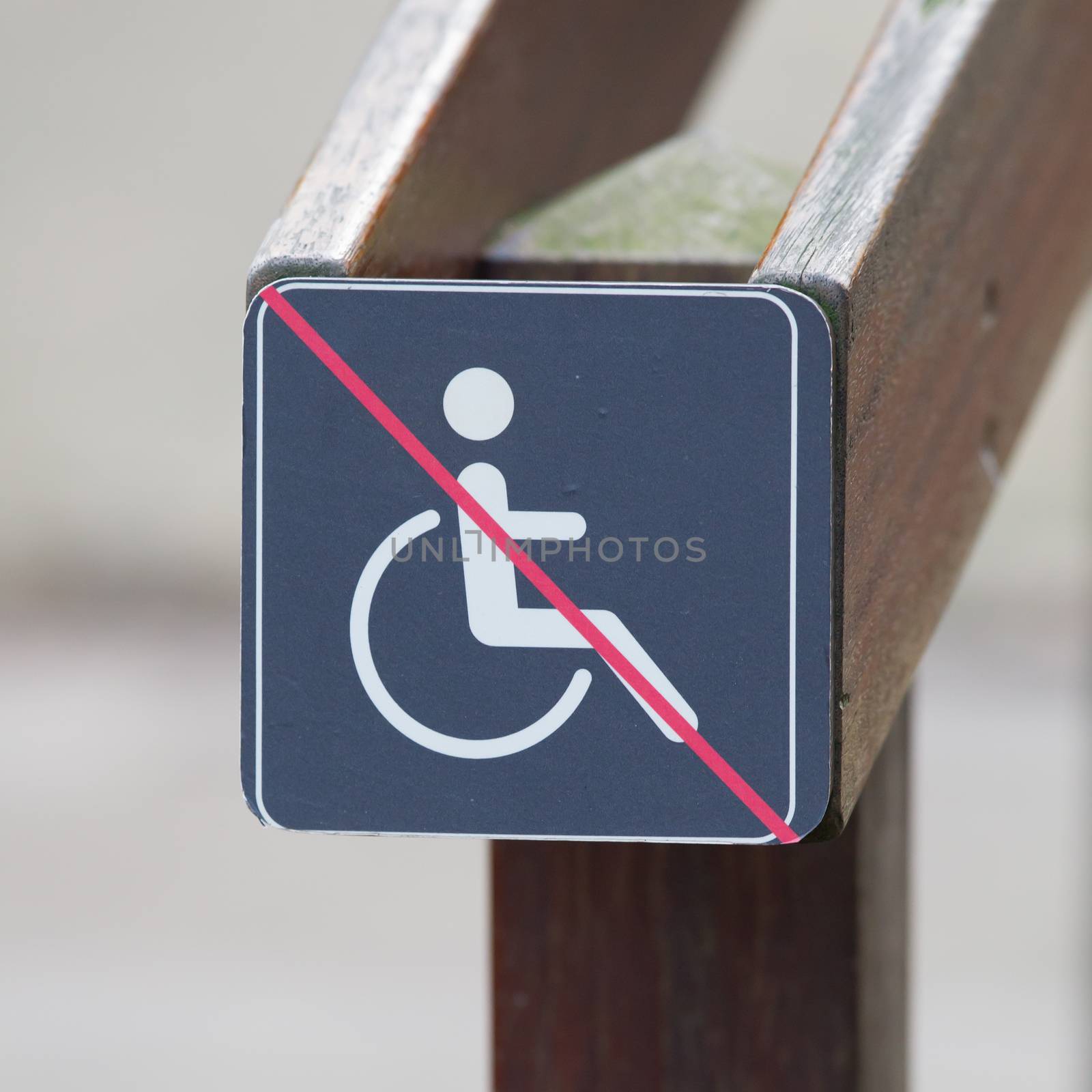Disabled sign, handicapped person icon at a stairs