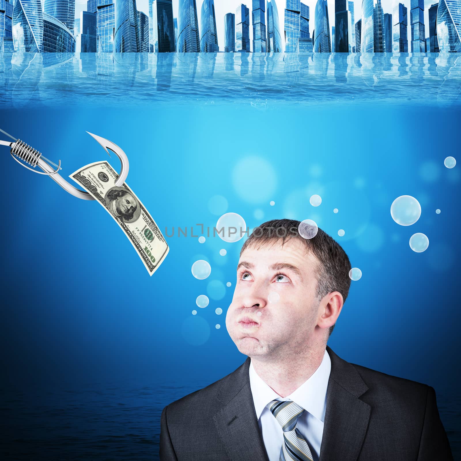 Businessman with inflated cheeks under water by cherezoff