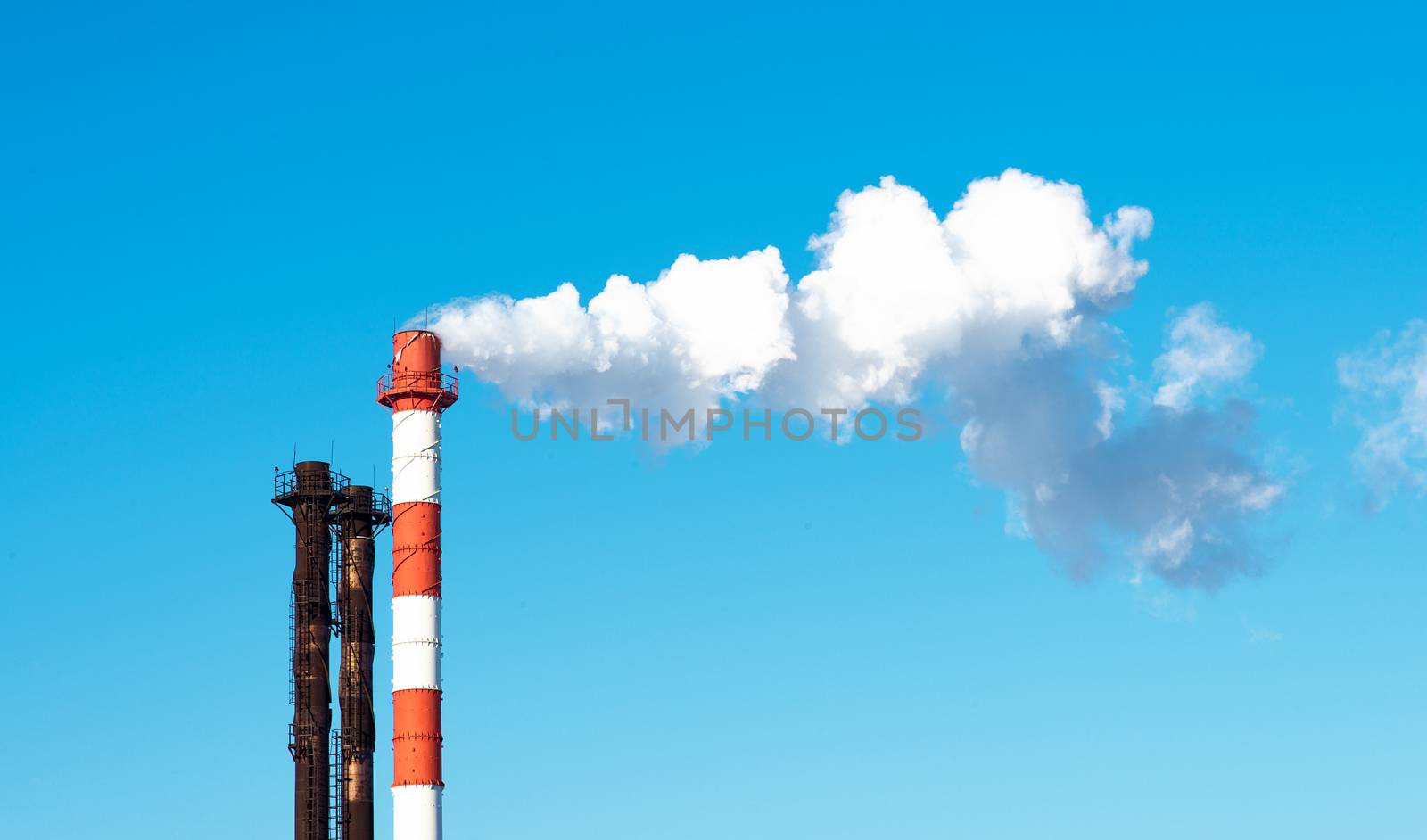  Atomic Power Station with blue sky and smoke