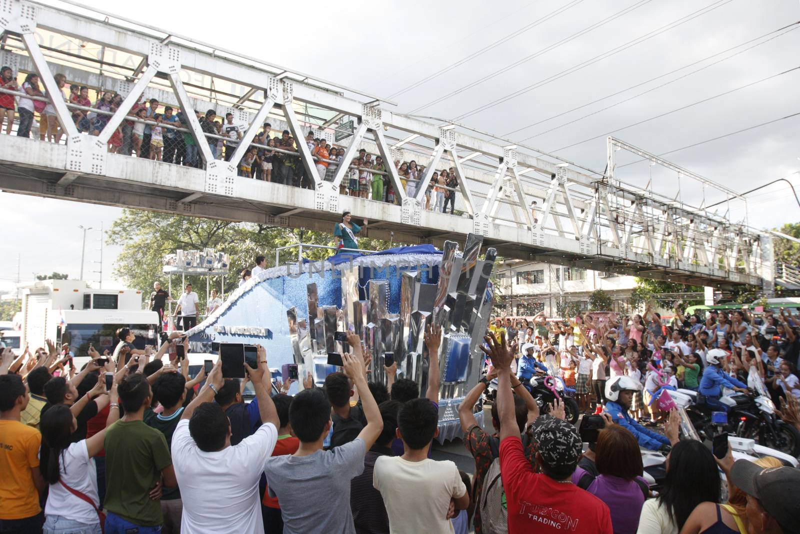 PHILIPPINES, Manila: Miss Universe 2015 Pia Alonzo Wurtzbach of the Philippines receives warm welcome from Filipino fans during her grand victory parade in Manila, Philippines on January 25, 2016. The parade began at past 2 p.m. at the Sofitel Philippine Plaza Manila, and ended at Ayala Avenue in Makati City. Wurtzbach was crowned Miss Universe in December in a drama-filled show after the pageant's host, comedian Steve Harvey, misread his cue card and initially announced Miss Colombia as the winner before apologizing and saying Wurtzbach had won.