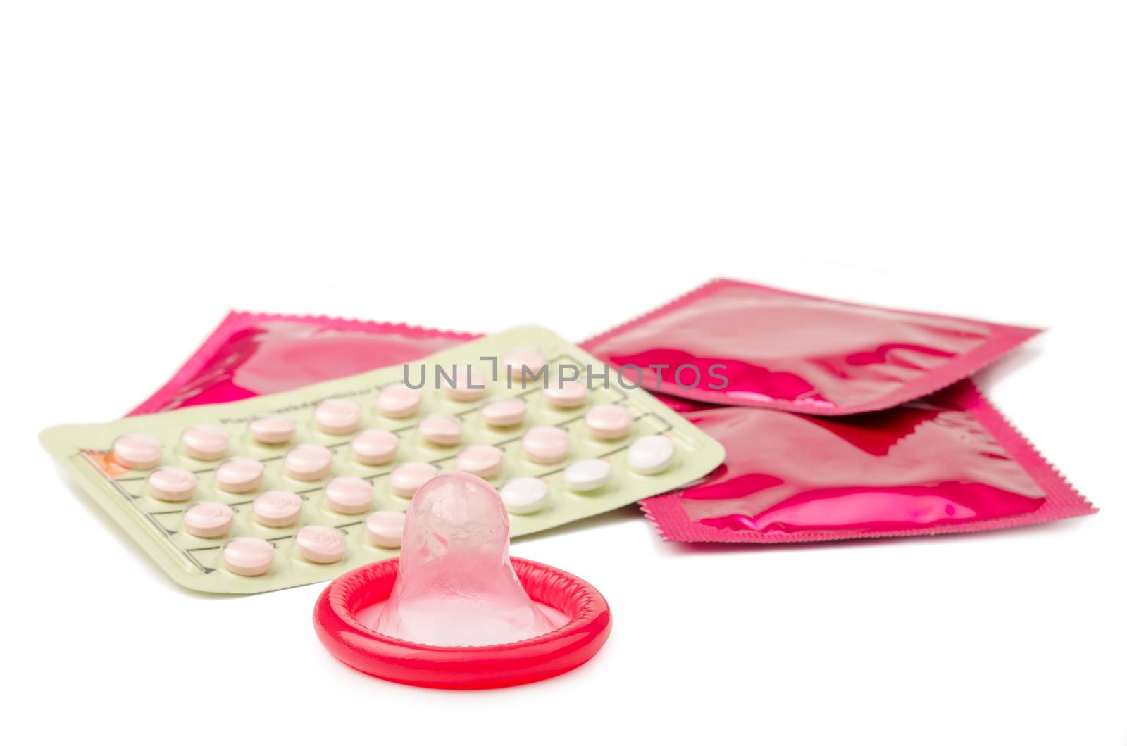 Condoms and Contraceptive on white background.