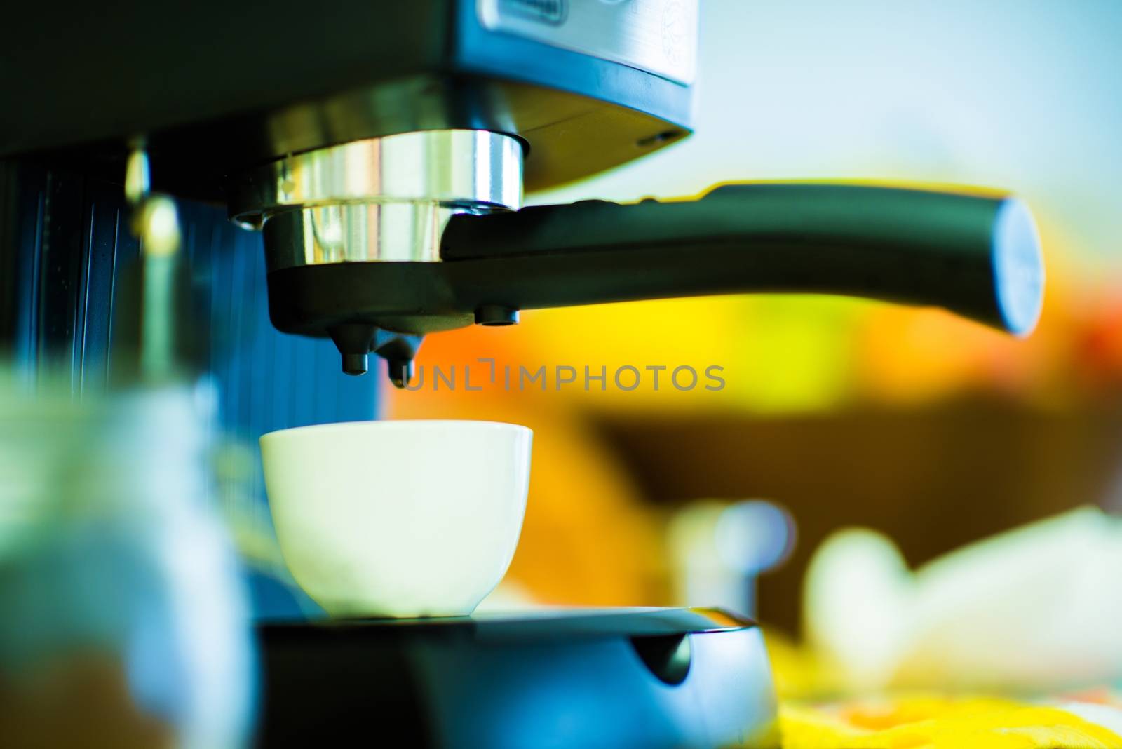 Small Espresso Machine in Work. Making Delicious Cappuccino Coffee.