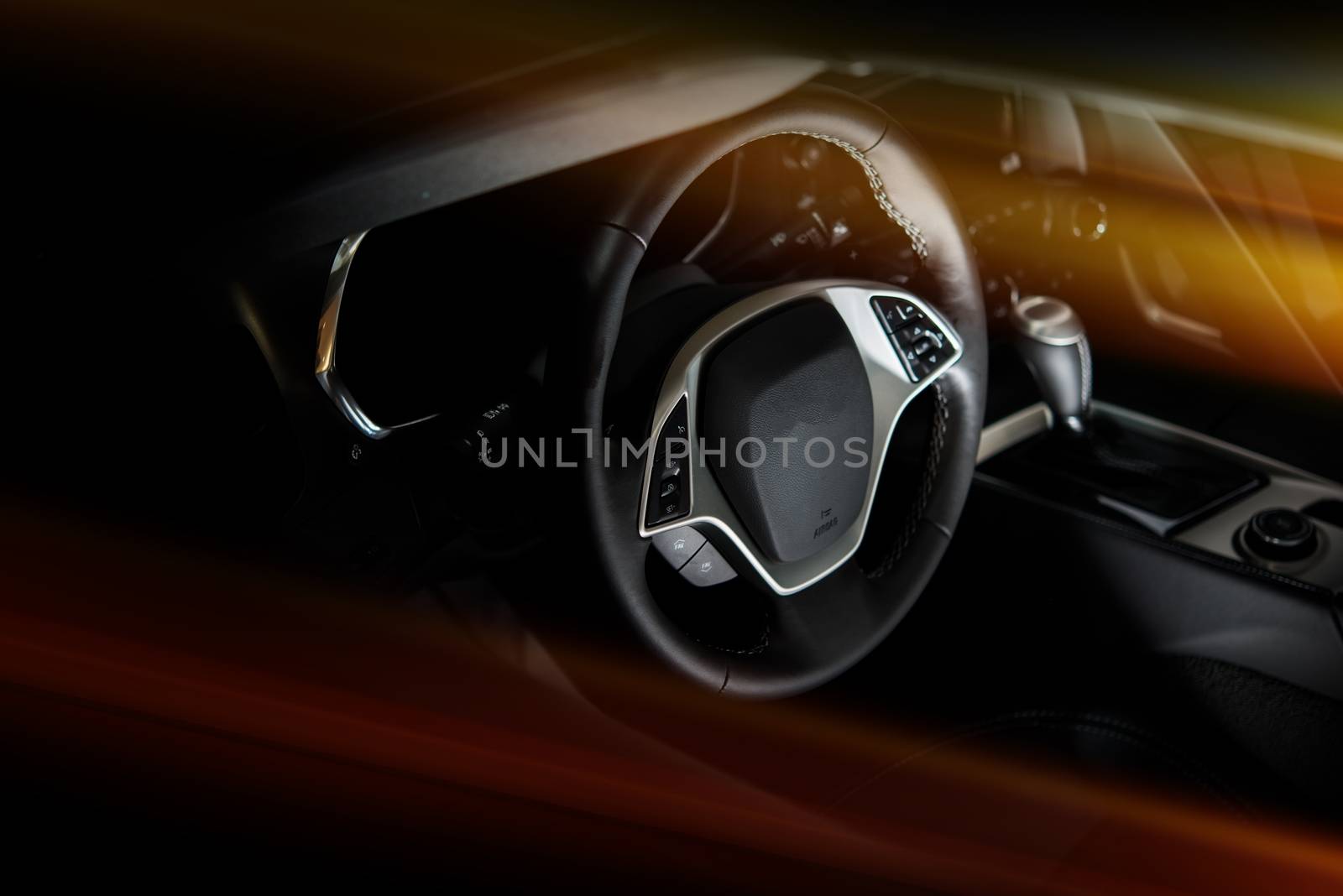 Dark Black Modern Super Car Cockpit with Reddish Light Rays.