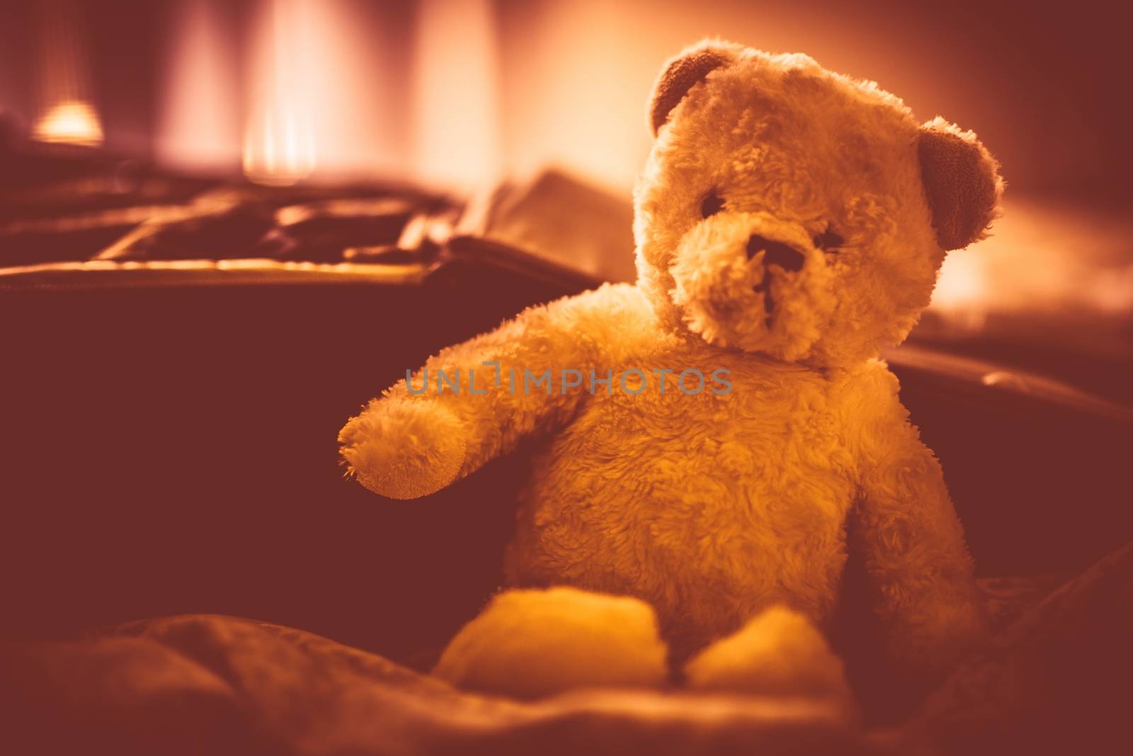 Plushy Teddy Bear in the Room. Plush Bear Toy. Warm Vintage Color Grading.