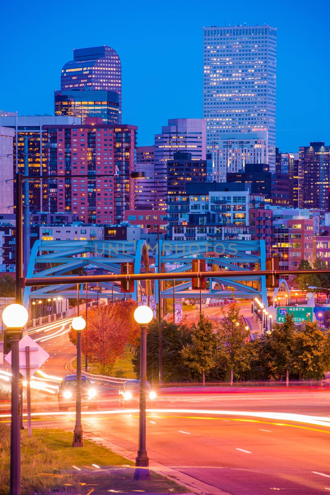 Denver Colorado Rush. Busy Denver Streets, Speer Boulevard Platte River Bridge and the City Skyline. October Night in Denver.