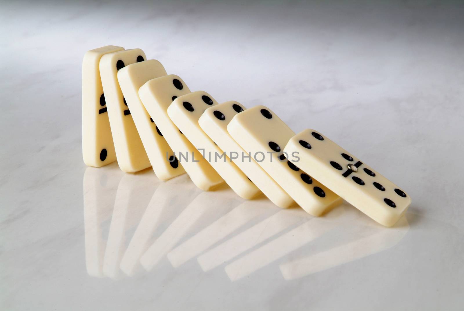 group dominoes fall on a neutral by diecidodici