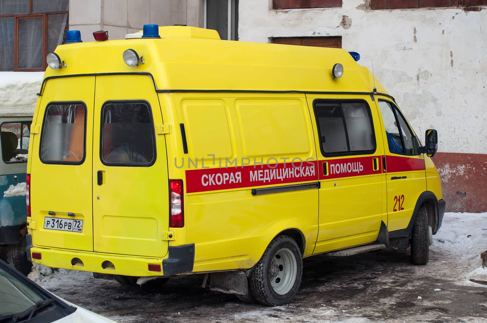 Yellow car of an emergency medical service. Tyumen, Russia