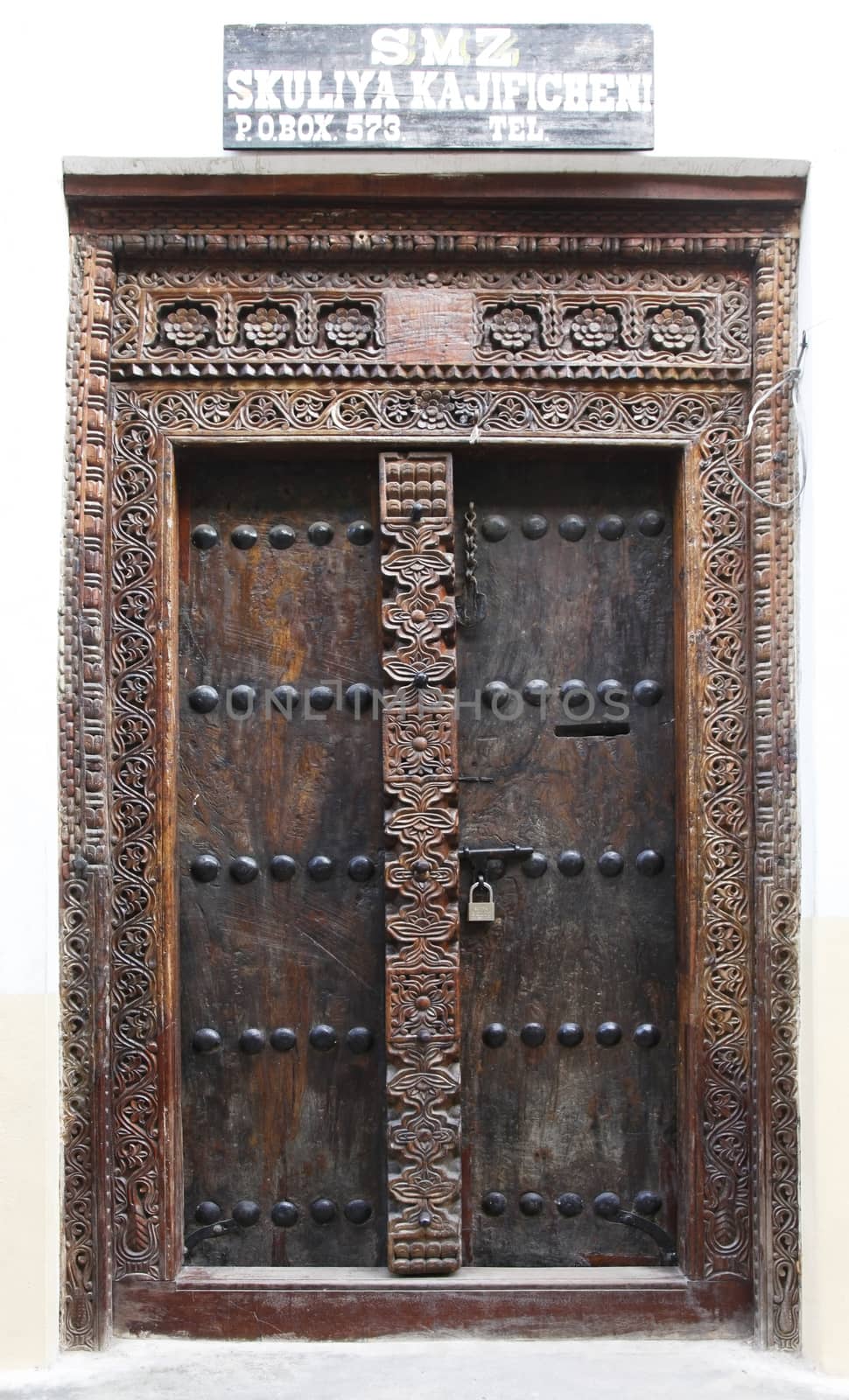 Old wooden door at Stone Town the capital of Zanzibar island East Africa.
