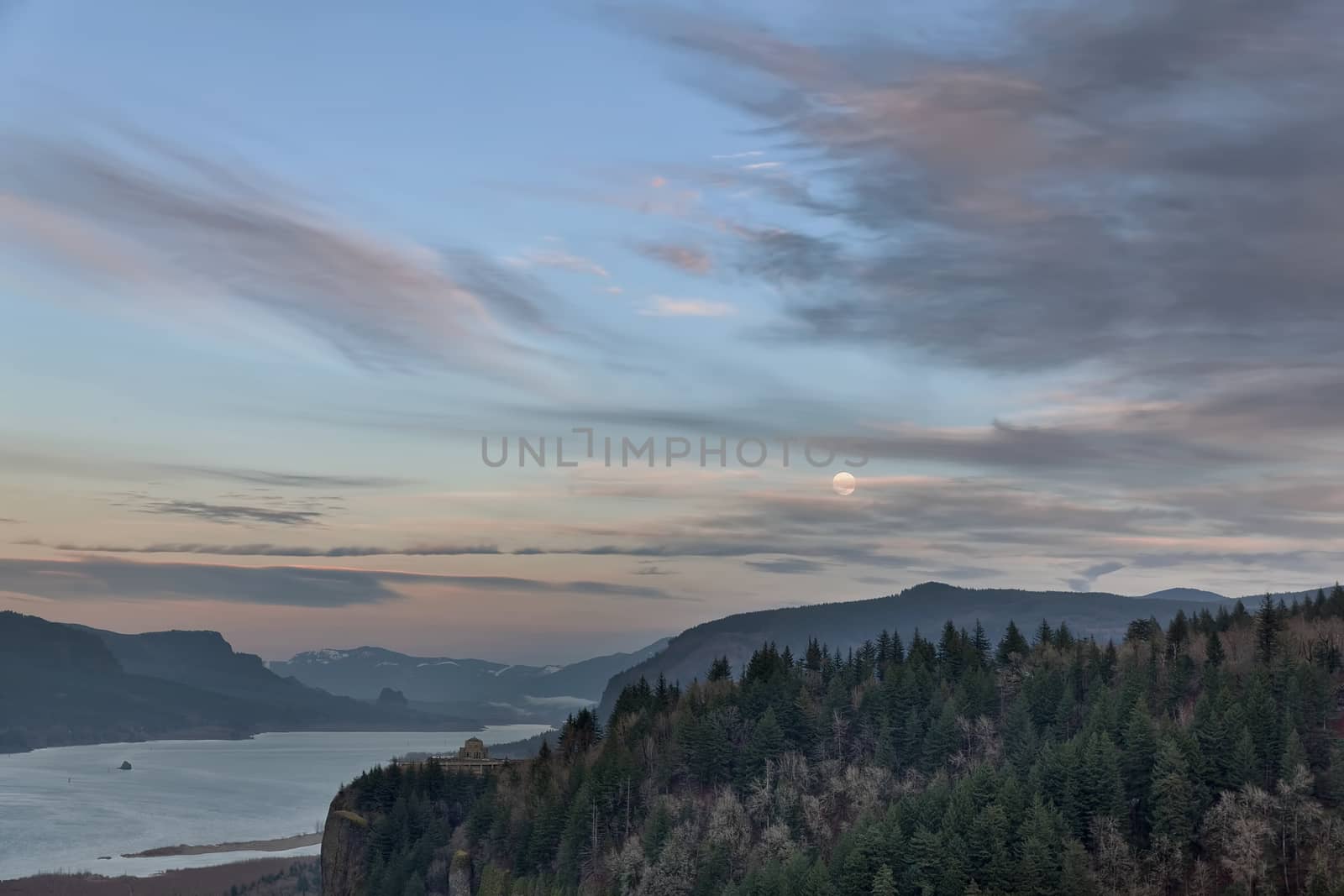Full Moon Rising over Crown Point in Columbia River Gorge Oregon at twilight