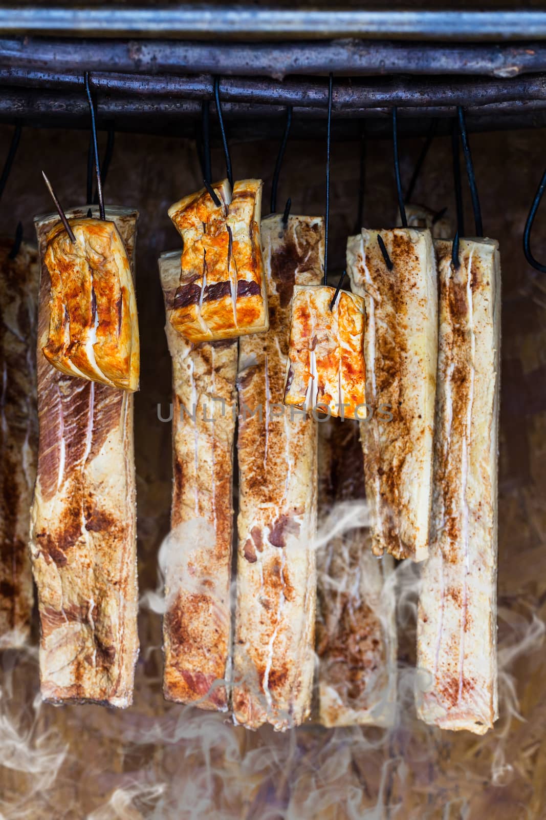 Home made ham in the smoke house in rural Romania