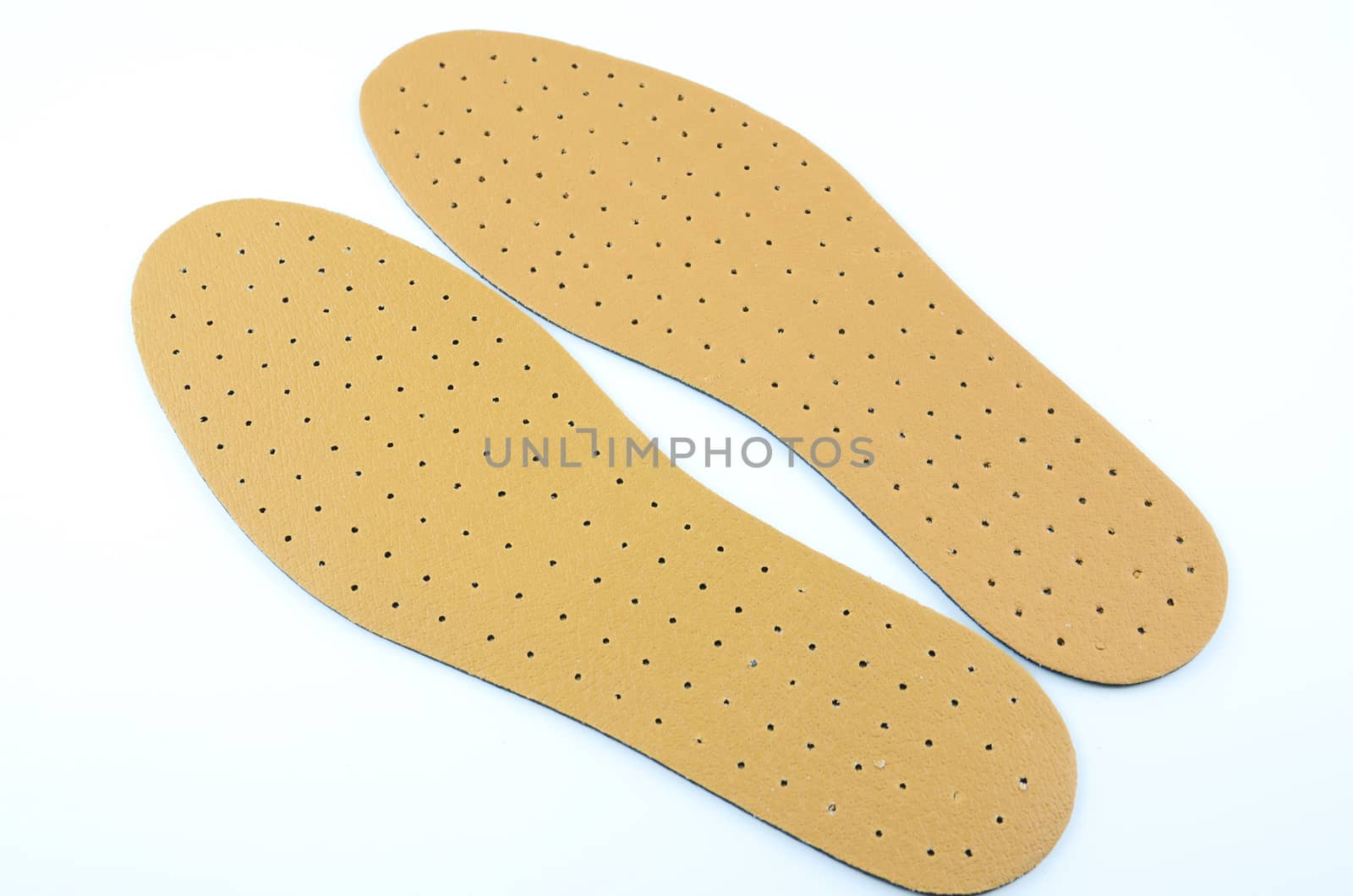 Brown leather shoe insoles provide additional comfort.
