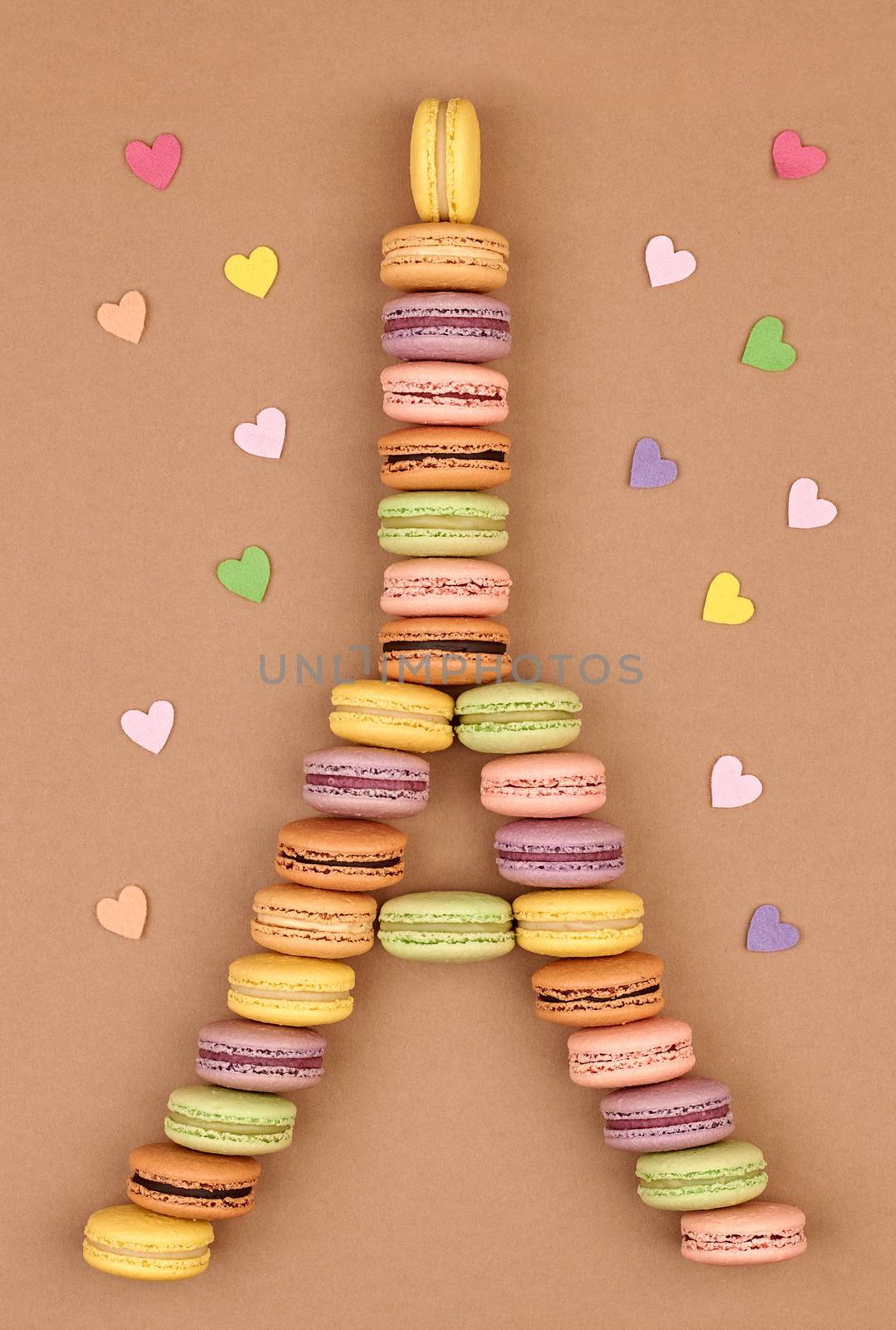 Macarons Eiffel Tower french sweet colorful,multicolored hearts.Fresh pastel delicious dessert on chocolate retro vintage background.Love,Valentines Day,romantic                                       