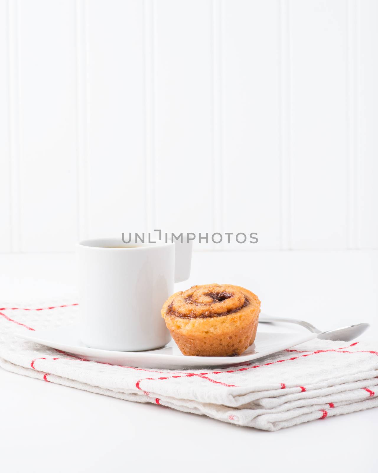 Fresh baked hot cinnamon rolls served with coffee.