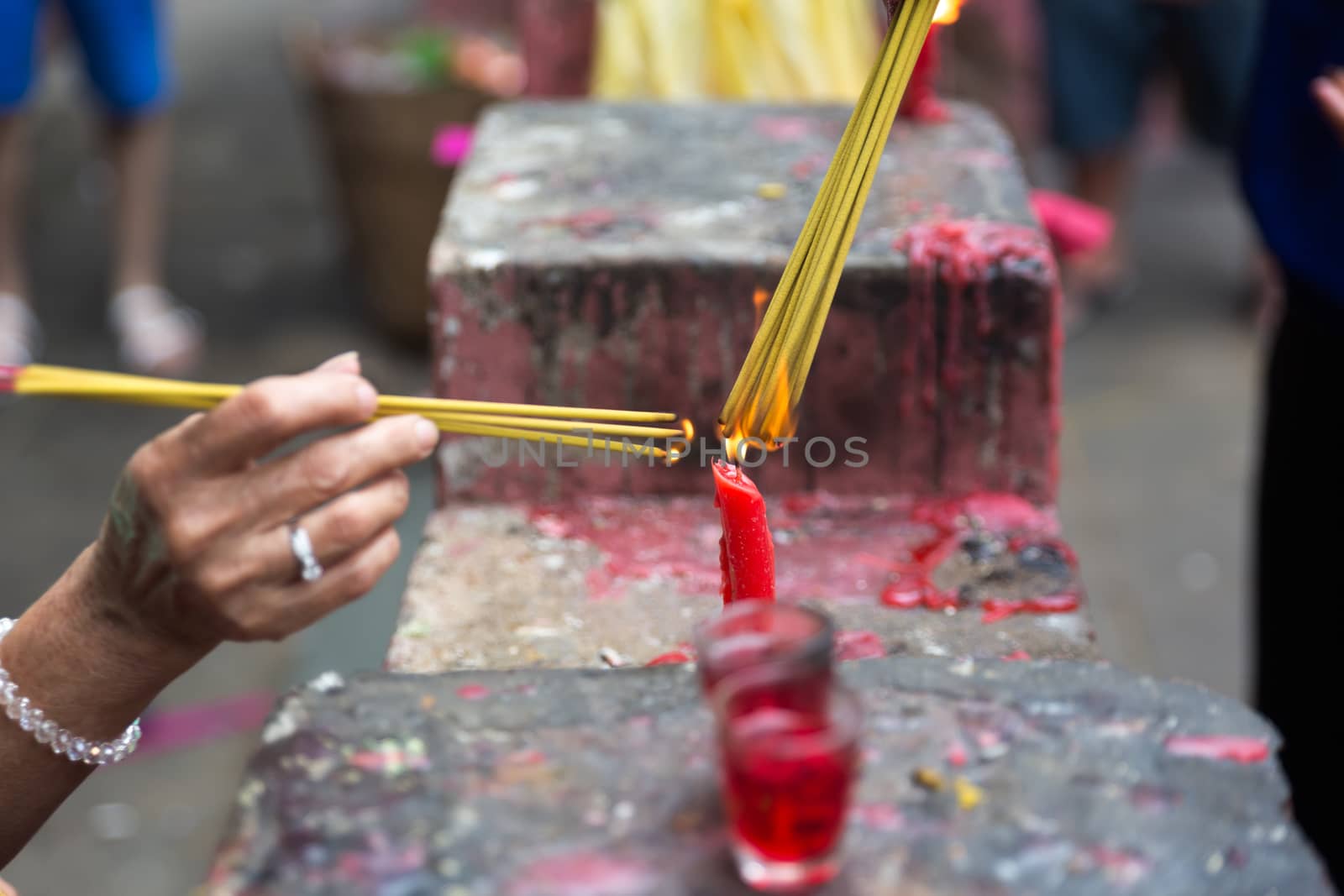 Burning joss sticks at Lunar New Year , Saigon, Vietnam by fisfra