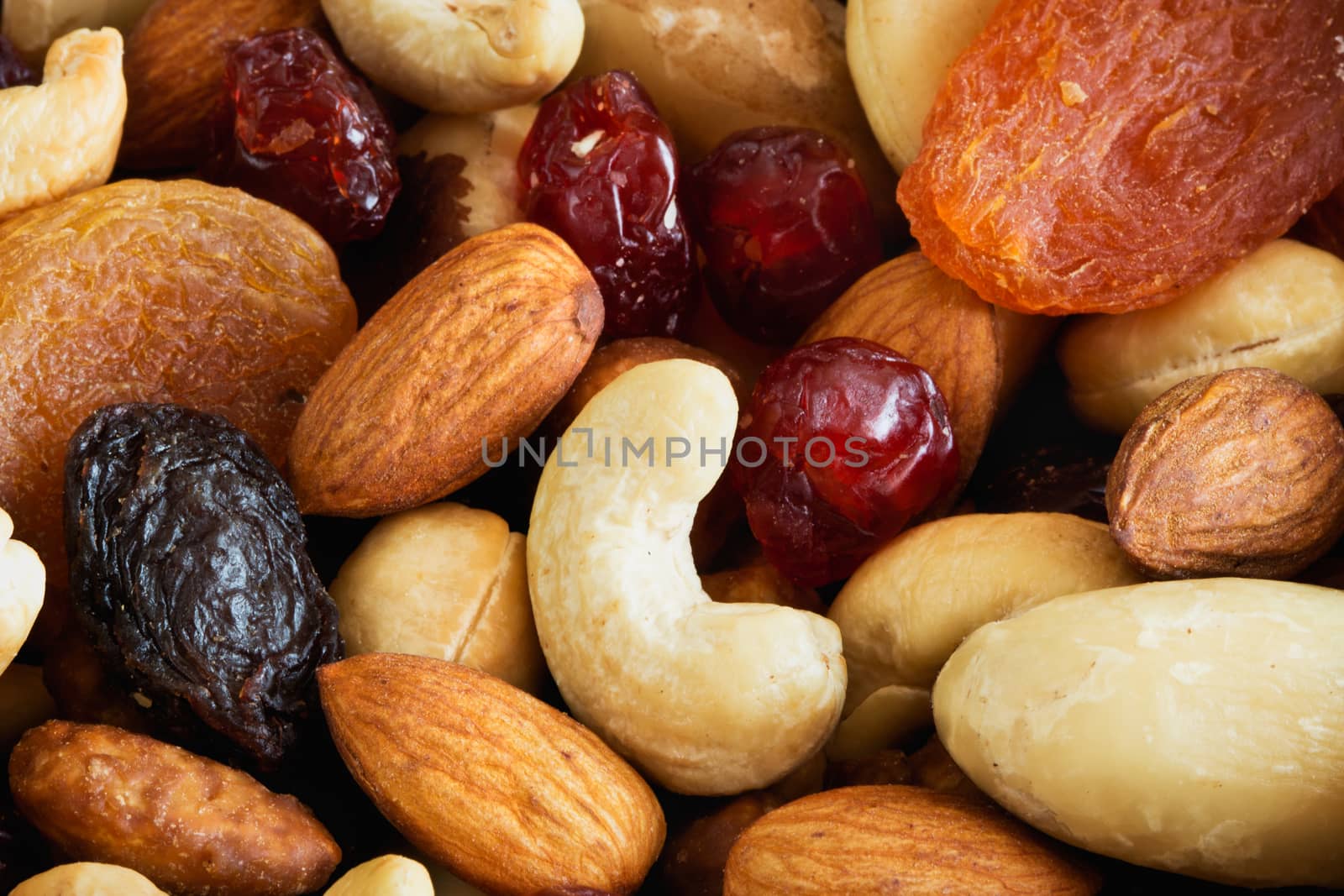 A mixture of various nuts with dried fruit closeup