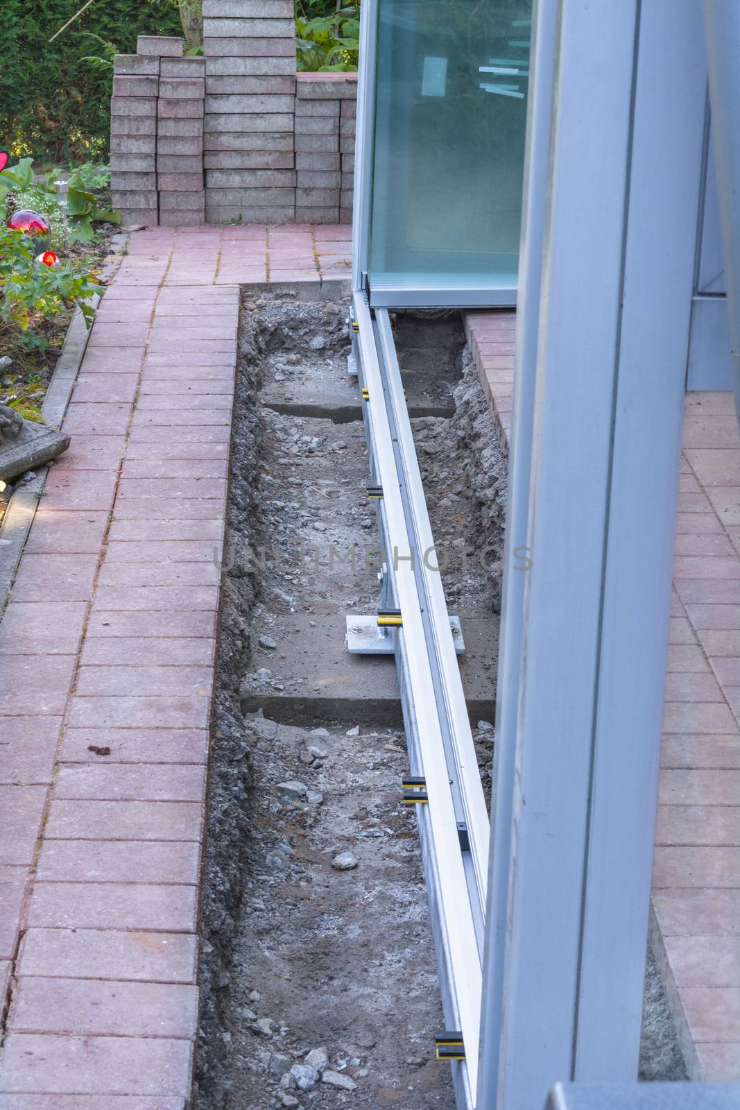 Construction site for a new conservatory, patio roof porch.