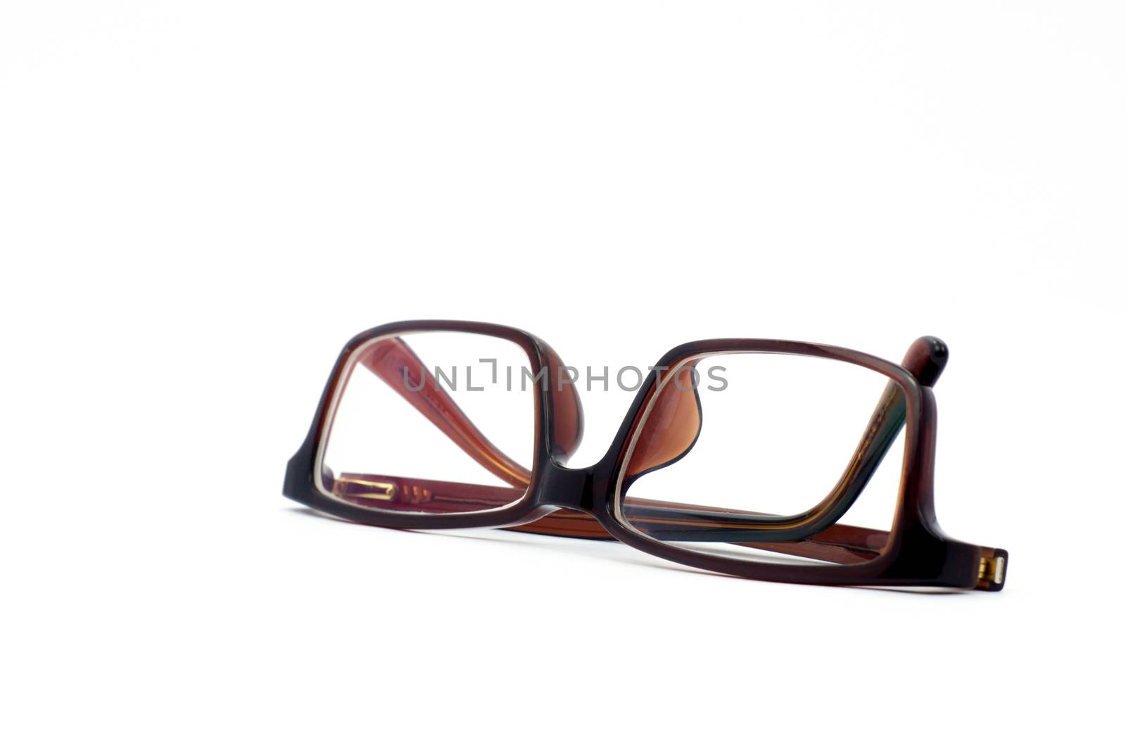Brown glasses isolated on white background