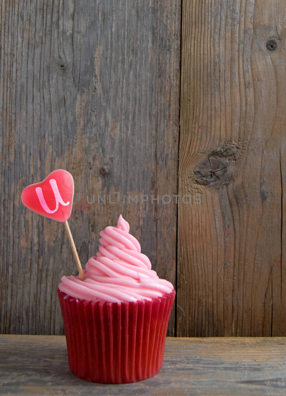 Pink cupcake with candy heart love u by unikpix