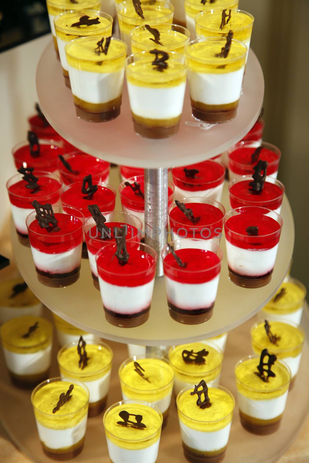 Colorful desserts and pastry served on a wedding party