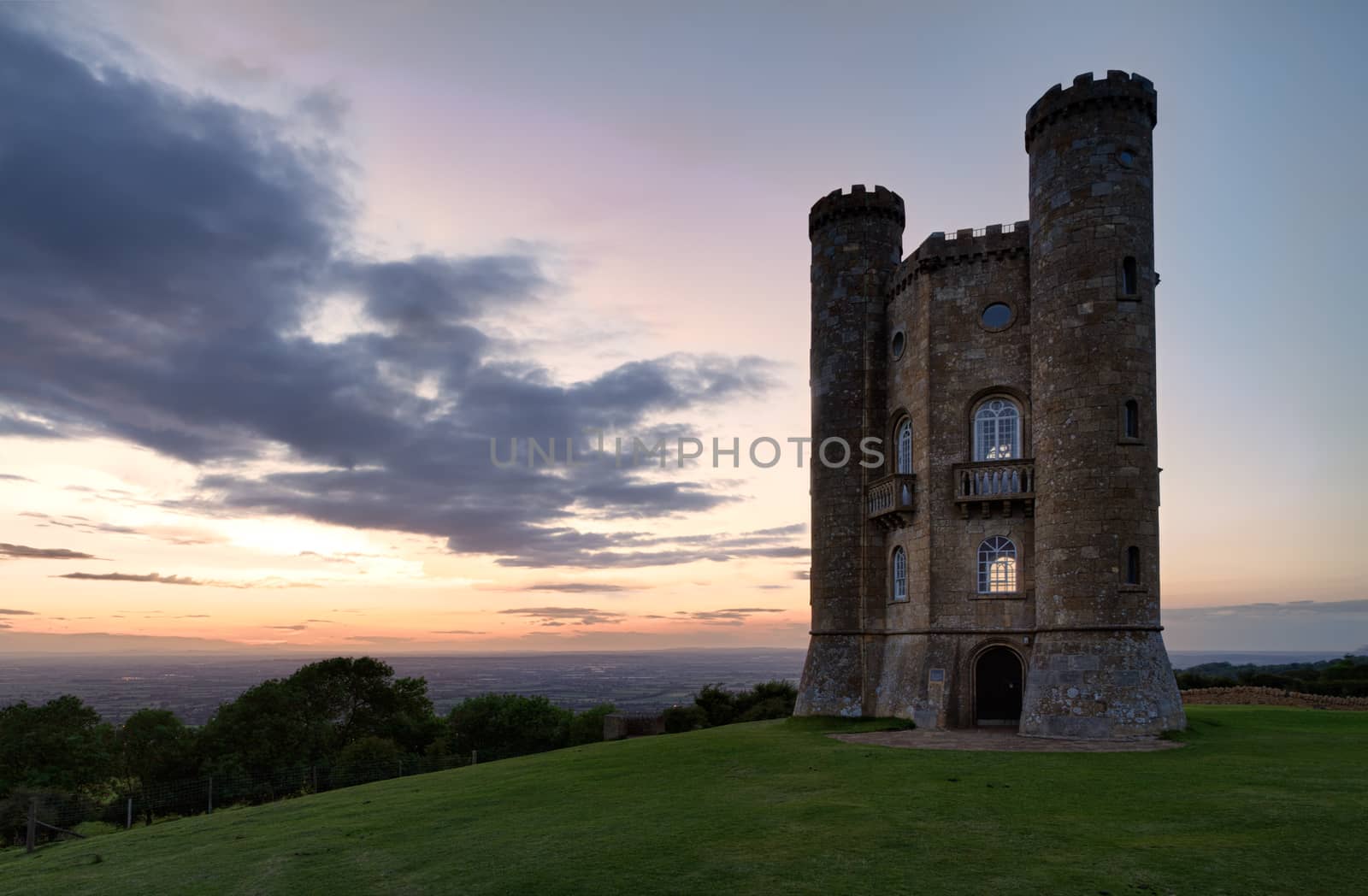 Broadway Tower with valley view after sunset Cotswolds, UK by fisfra