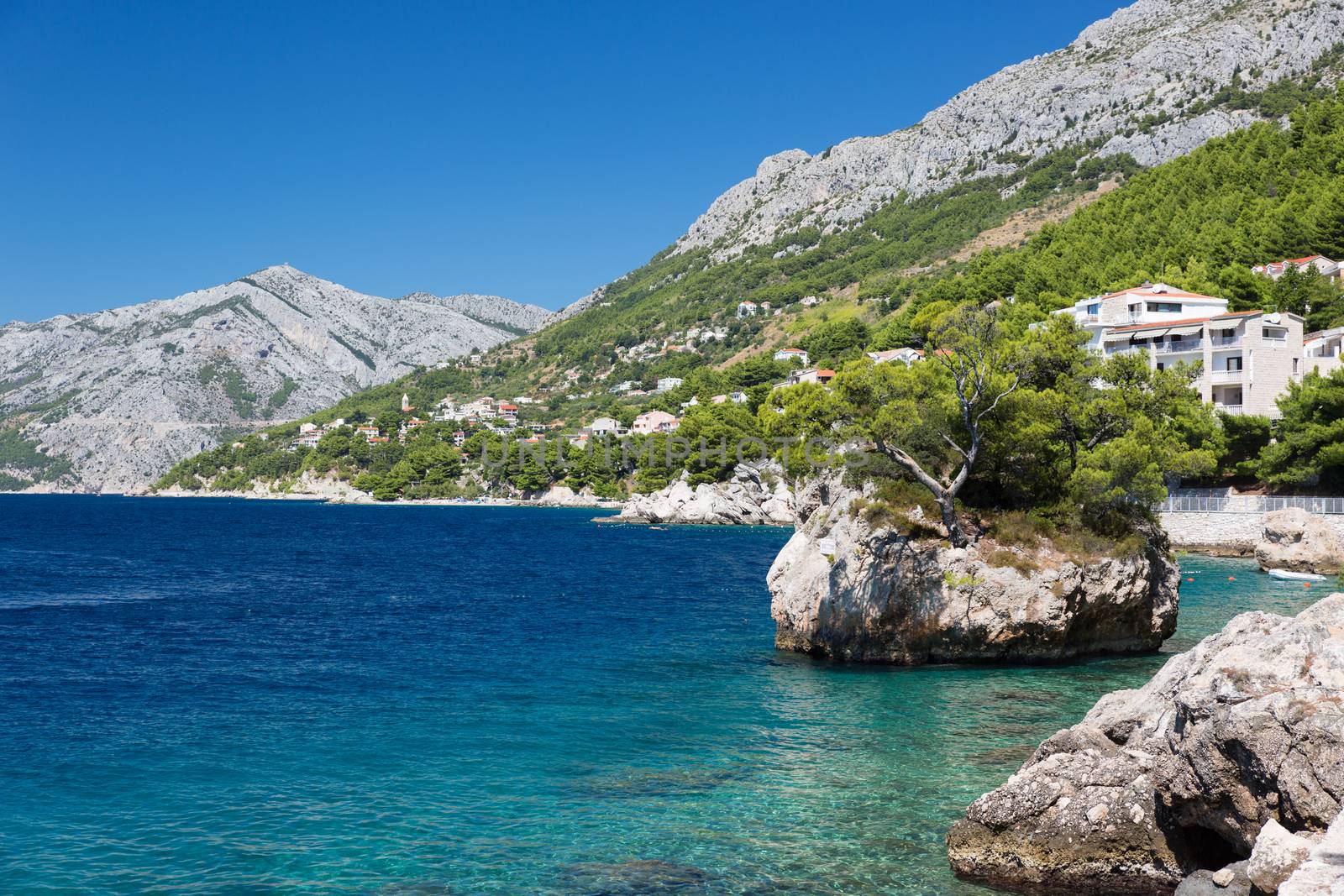 Croatian beach at a sunny day, Brela, Croatia by fisfra