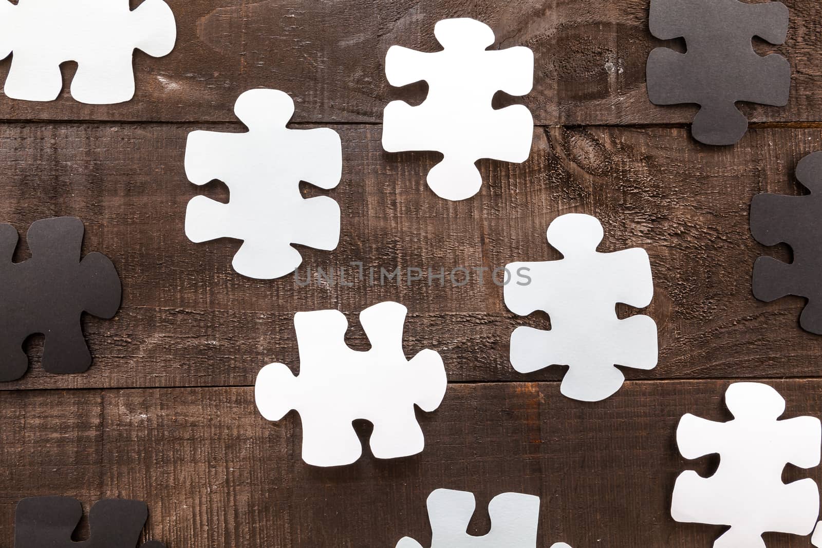 Photo illustration showing the business concept of engineering applied to industries or internet with puzzle pieces