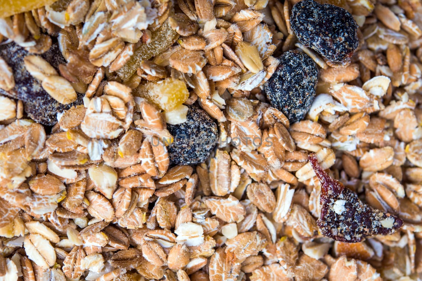 Muesli with Dried Fruits Closeup Photo. Healthy Breakfast Choice.