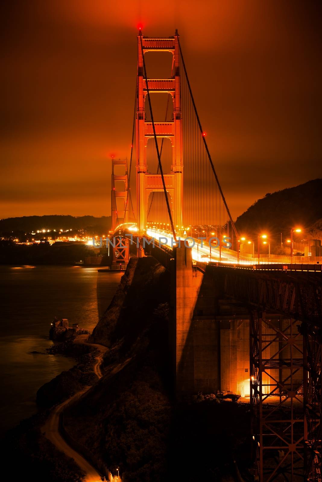 The Golden Gate Bridge at Night in Vertical Photography. San Francisco, California, USA.