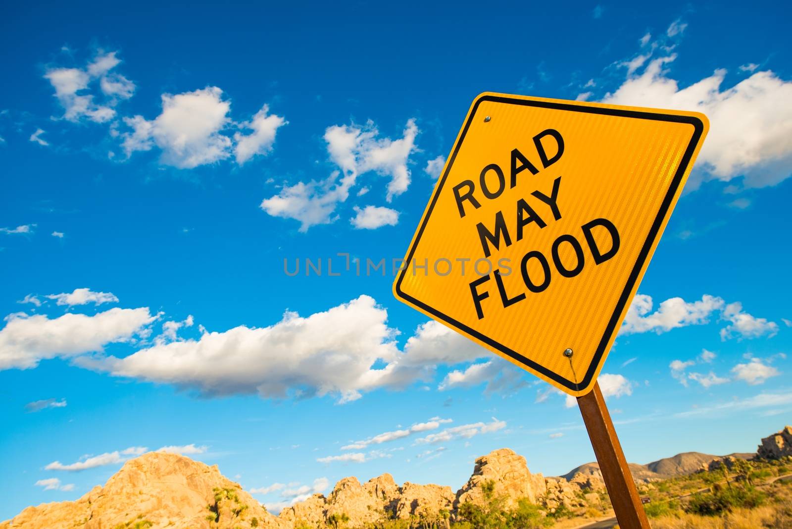 Road May Flood Warning Sign in California Flash Flood Desert Area.