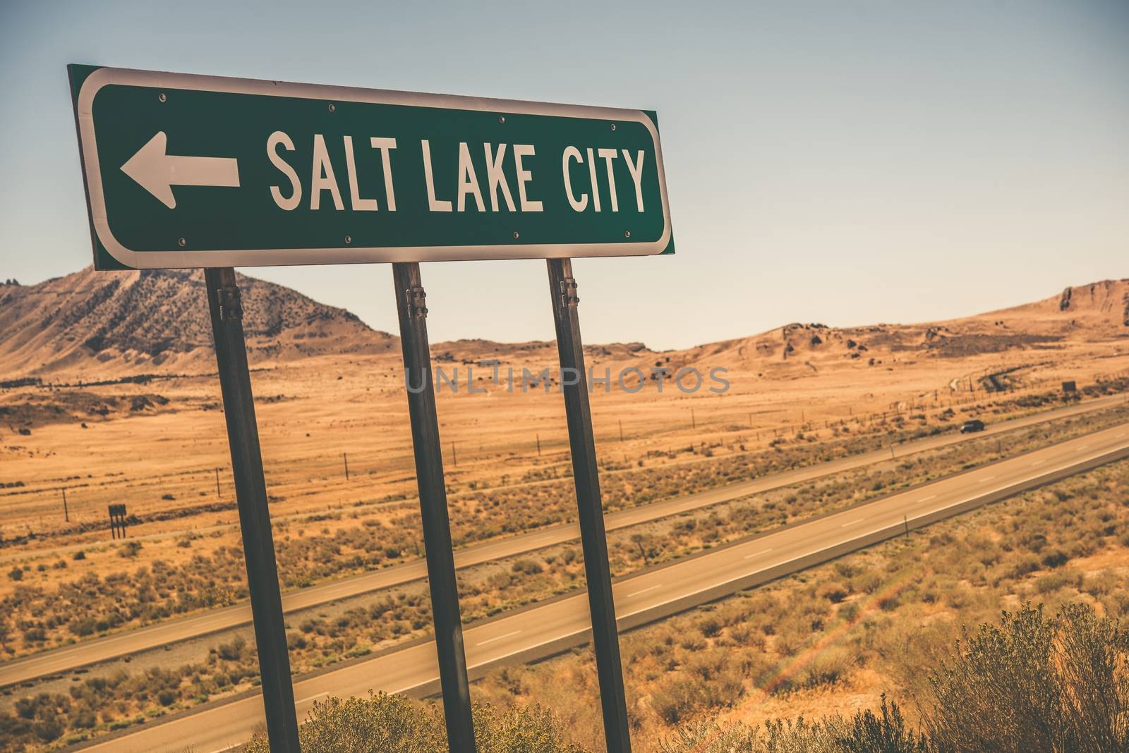 Salt Lake City Road Sign on the Interstate I-80 Somewhere near Utah and Nevada Border. 