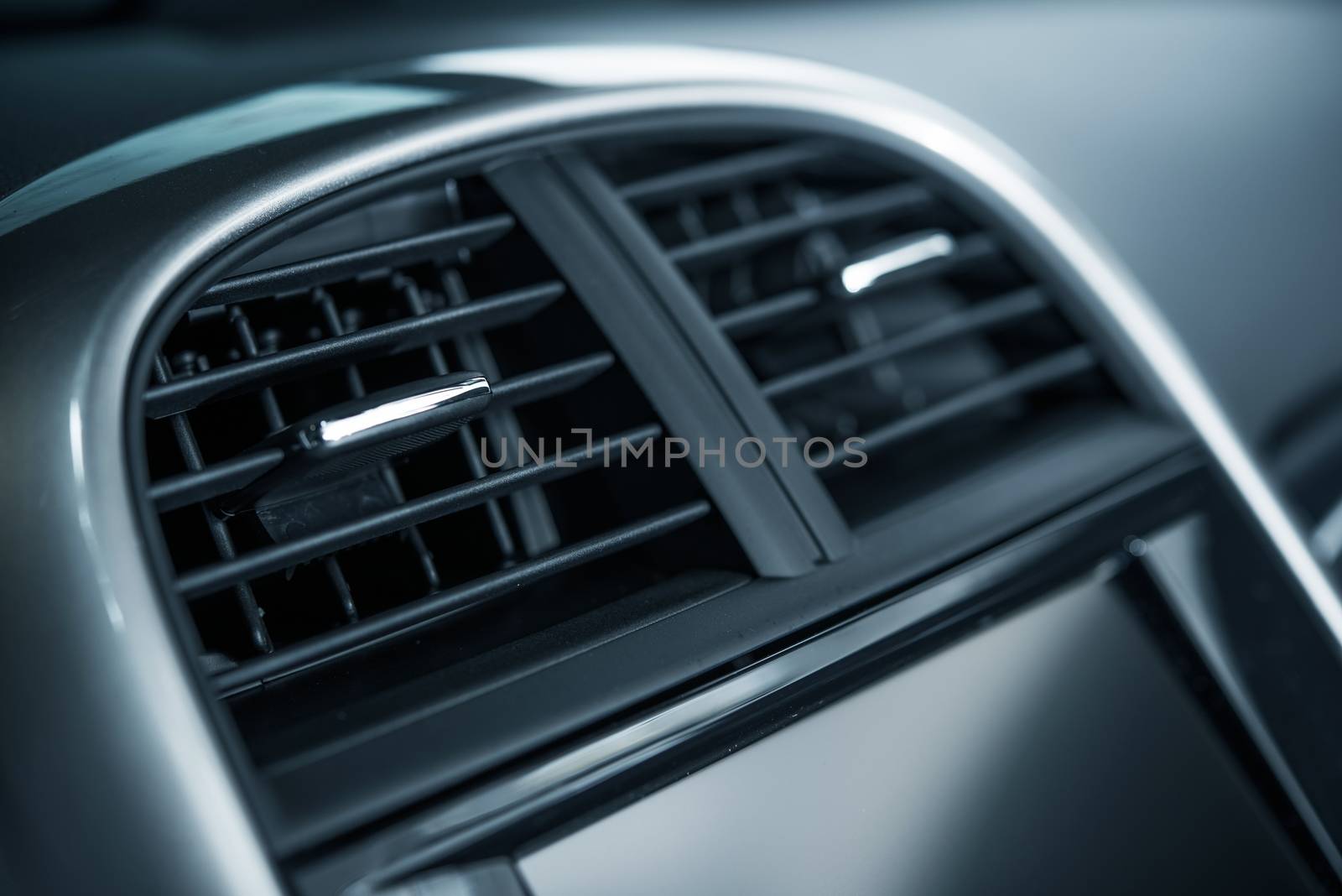 Modern Car Air Vent Closeup. Air Quality in a Car. Cooling and Heating Car Vents.
