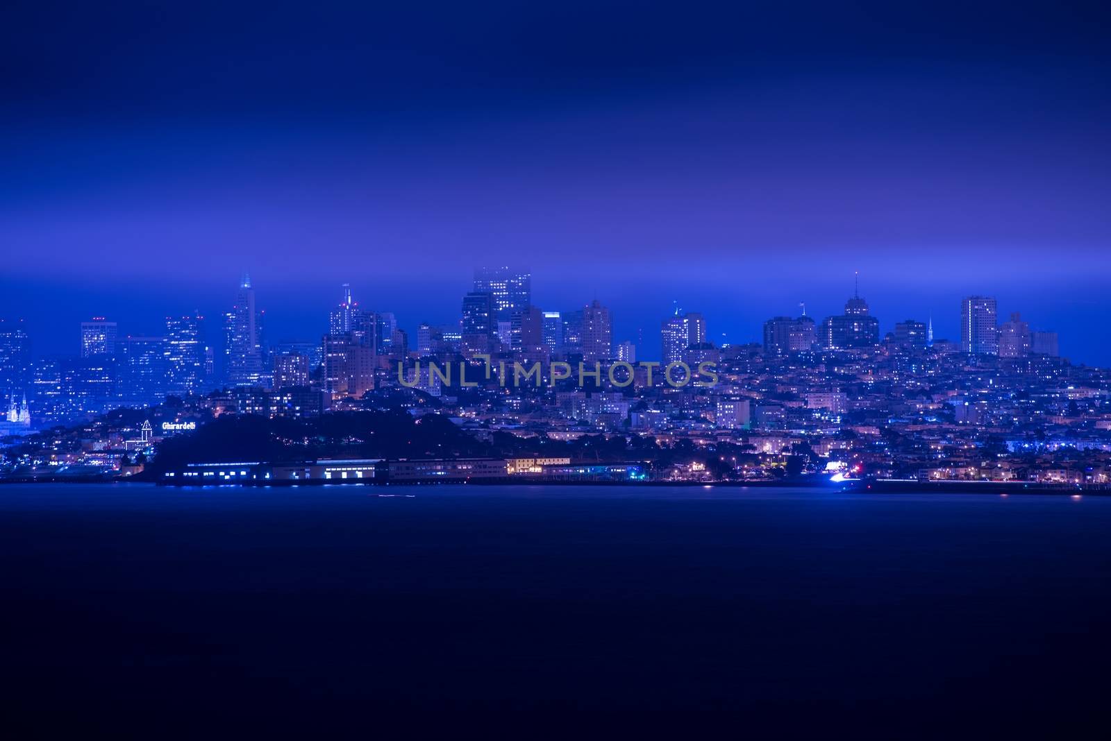 San Francisco Night Panorama. San Francisco Skyline and the Bay at Night. California, United States.