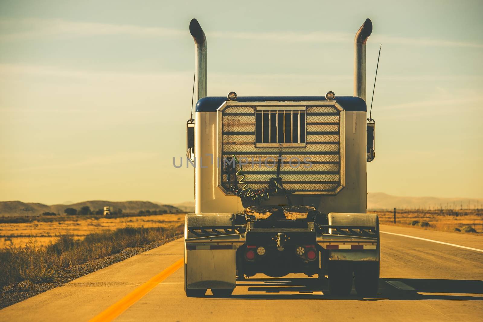 Tractor Trailer on the Highway. Trucking Theme. 