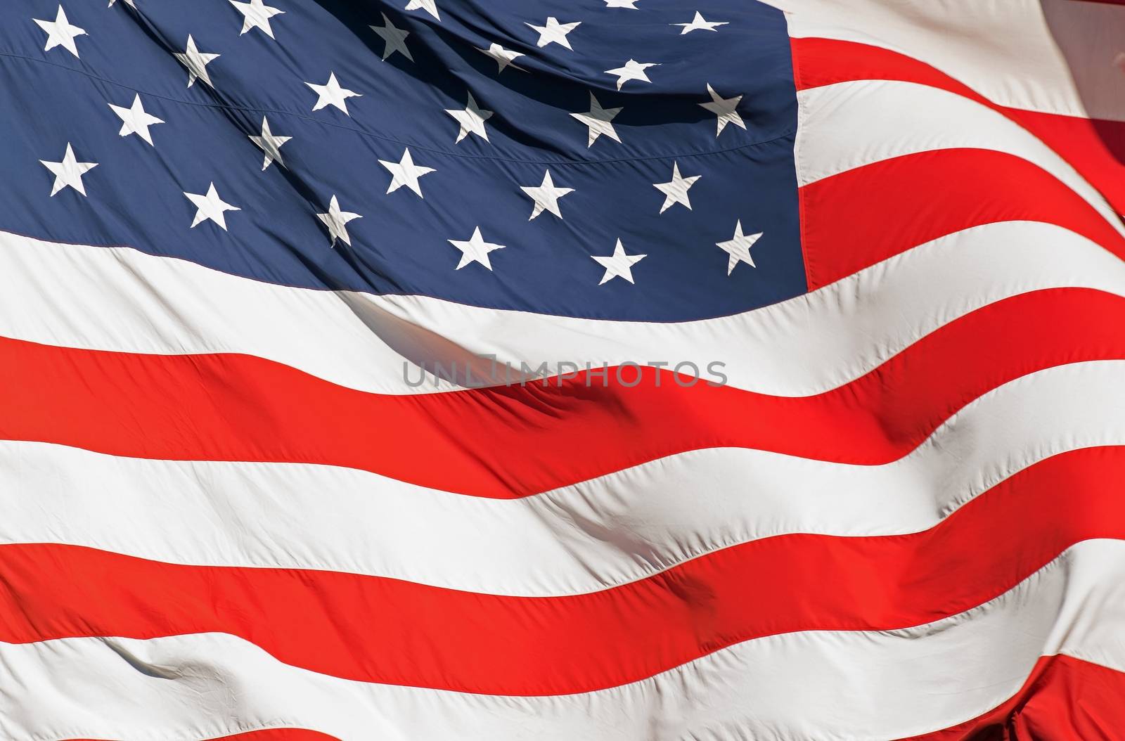 Waving Real Textile American Flag Closeup Photography. United States of America Nation Flag.