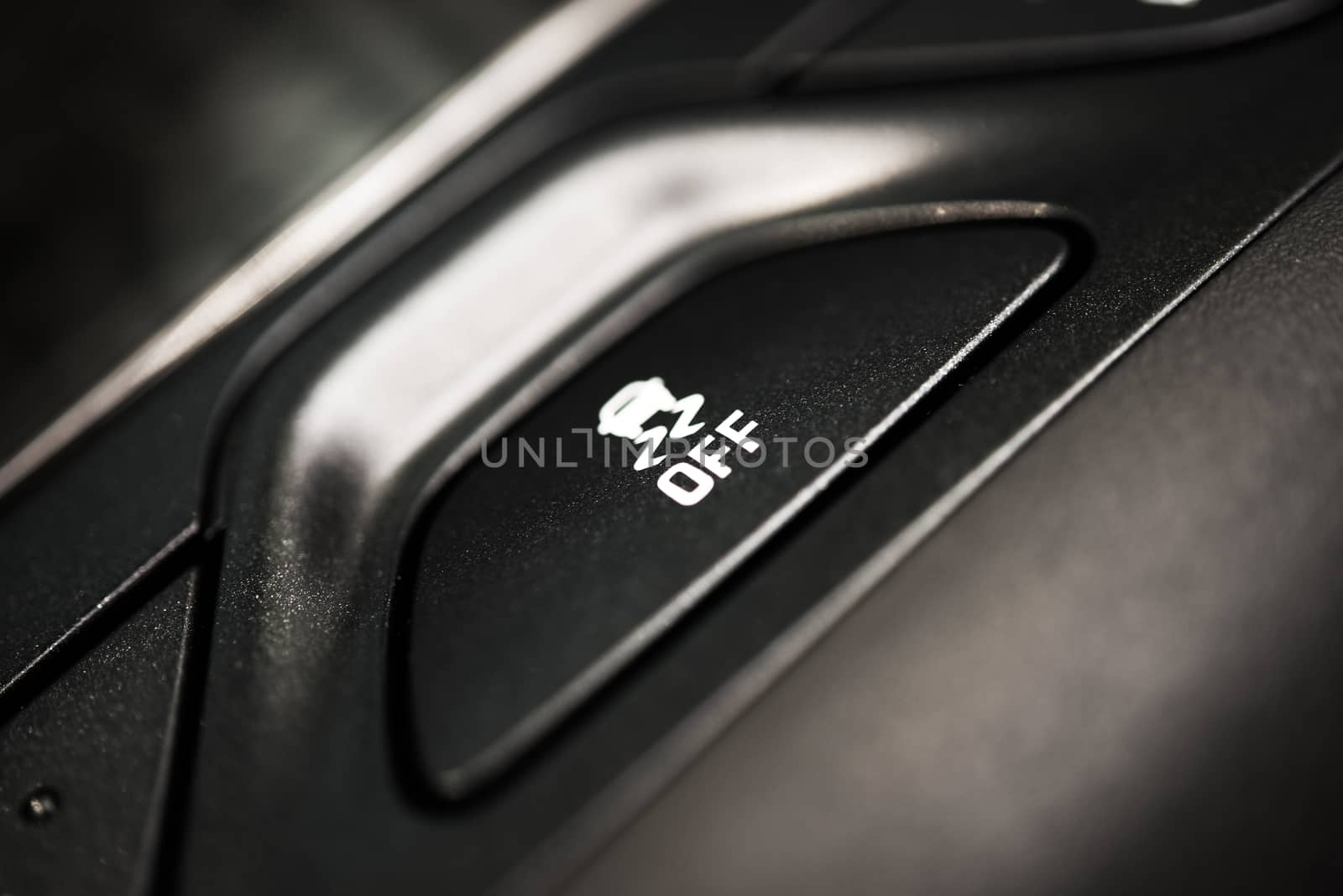 Traction Control Off Button Closeup. Traction Control in Car System. Safety Car Feature.