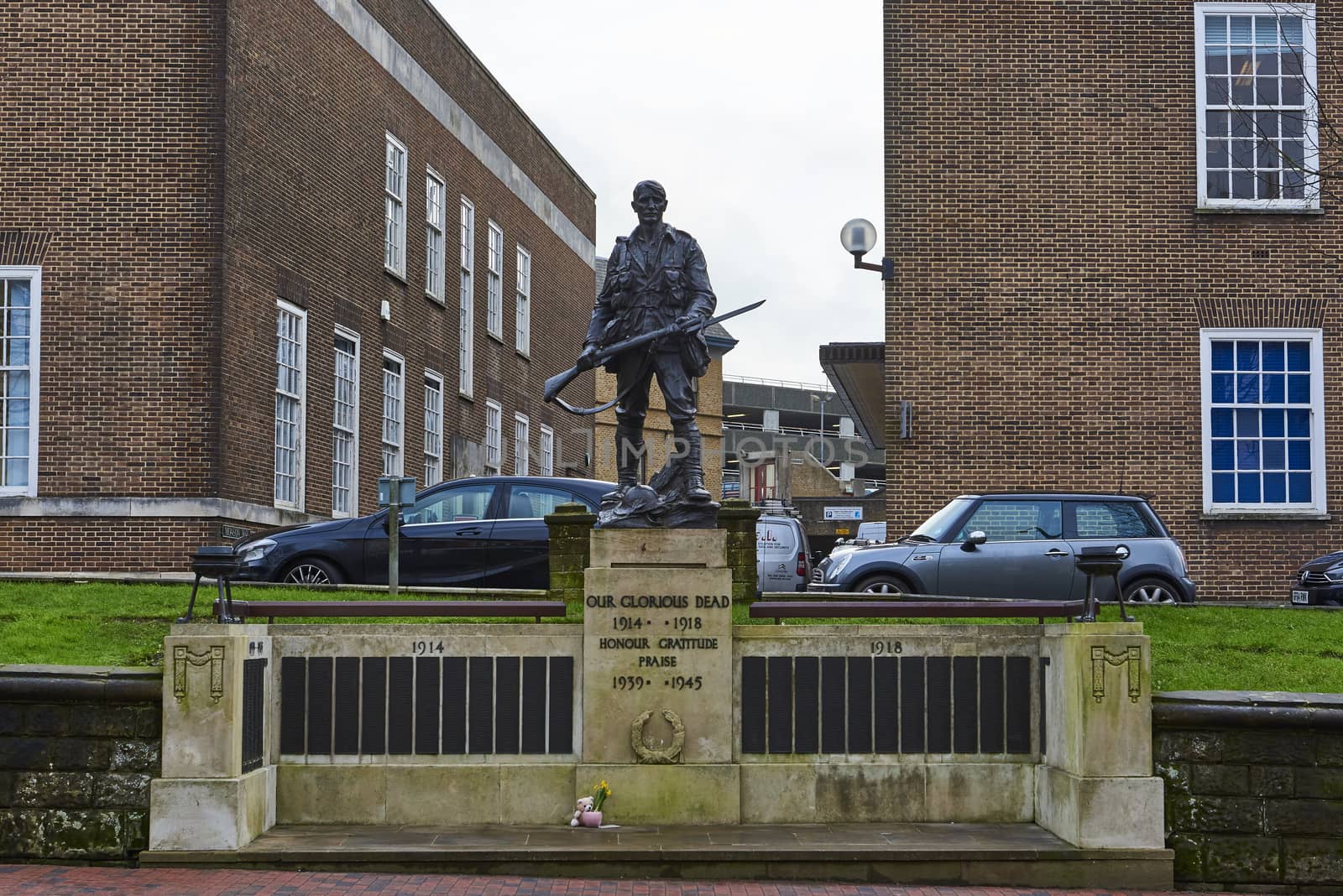 TUNBRIDGE WELLS, UK - JANUARY 26: Front shot of bronze War memorial depicting soldier holding rifle. January 26, 2016 in Tunbridge Wells.
