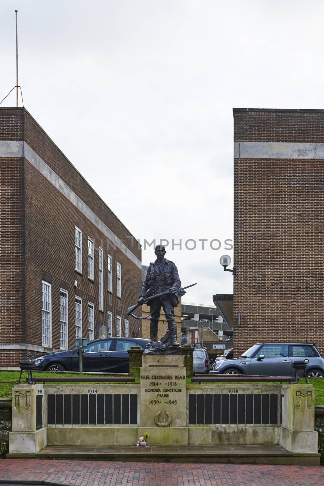TUNBRIDGE WELLS, UK - JANUARY 26: Front shot of bronze War memorial depicting soldier holding rifle. January 26, 2016 in Tunbridge Wells.
