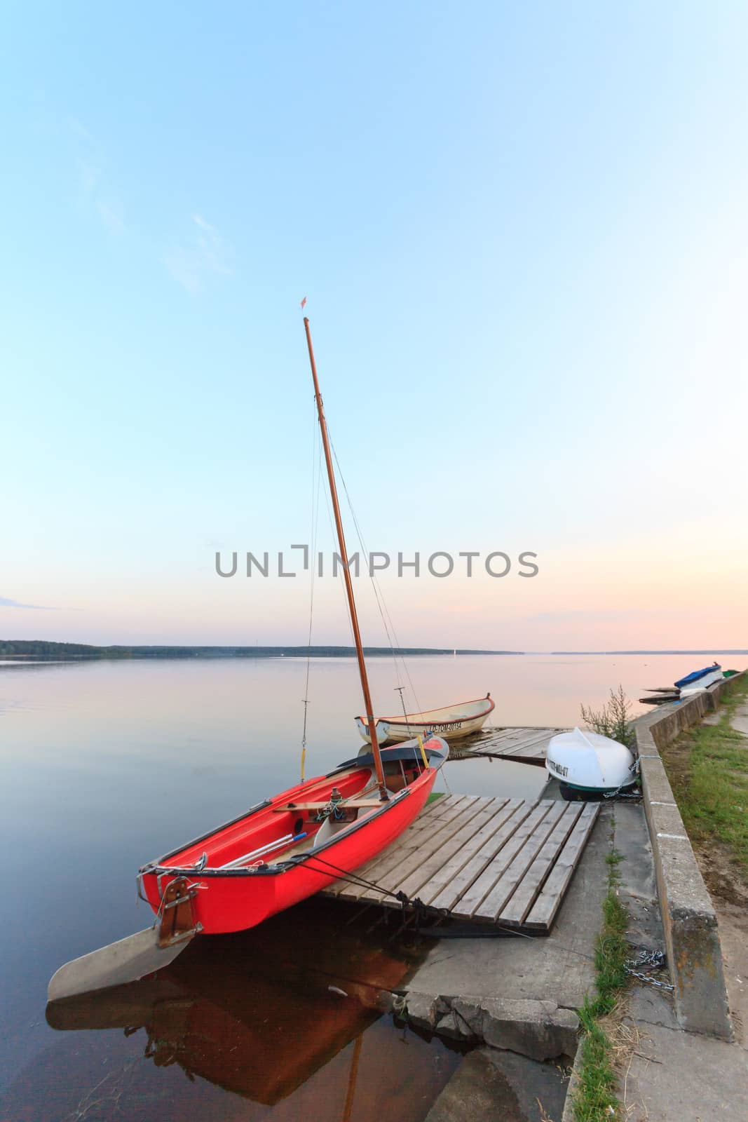 boat on the blue lake with cloudy sky, nature series