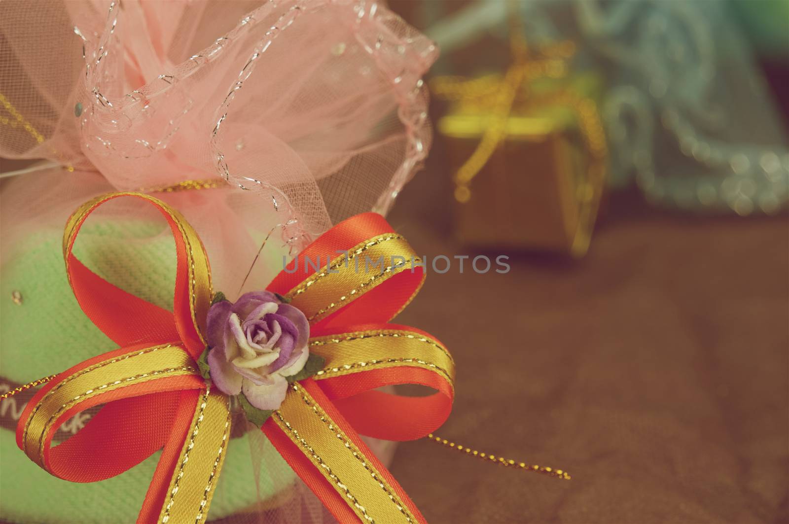 Purple flower with gold and orange ribbon bow vintage style by eaglesky