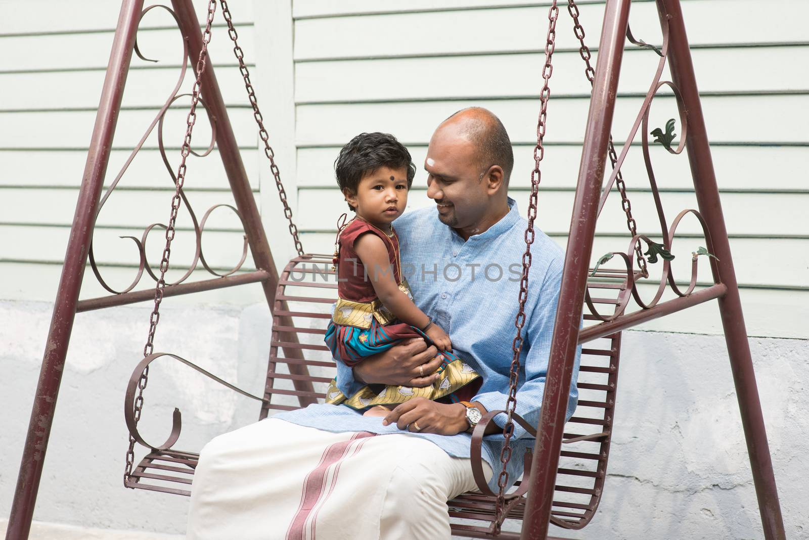 Indian father and daughter outdoor by szefei