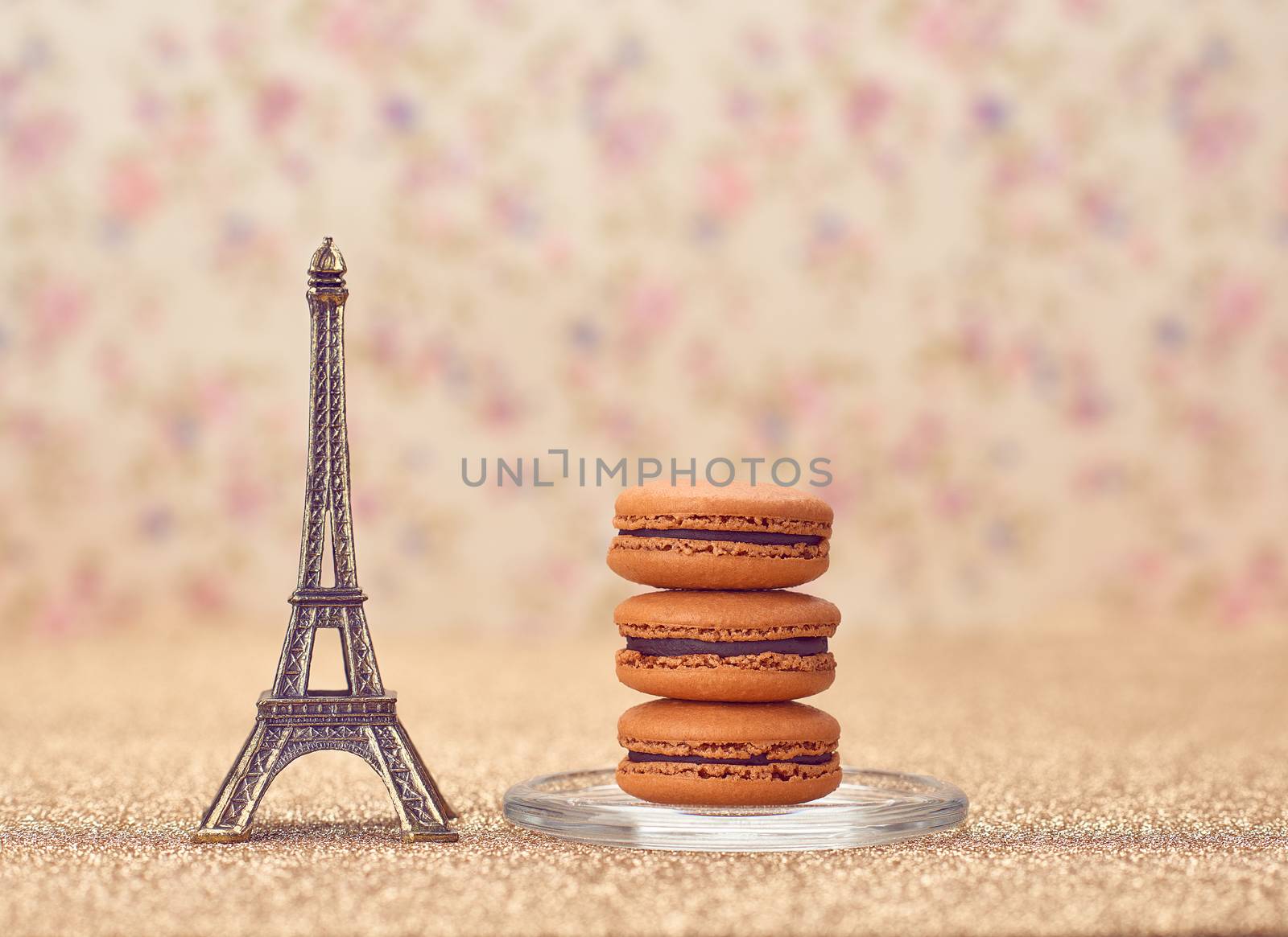 Macarons french dessert, still life. Eiffel Tower, souvenir from Paris. Fresh dessert chocolate, vintage retro romantic style.Unusual creative art greeting card, shiny floral background,bokeh