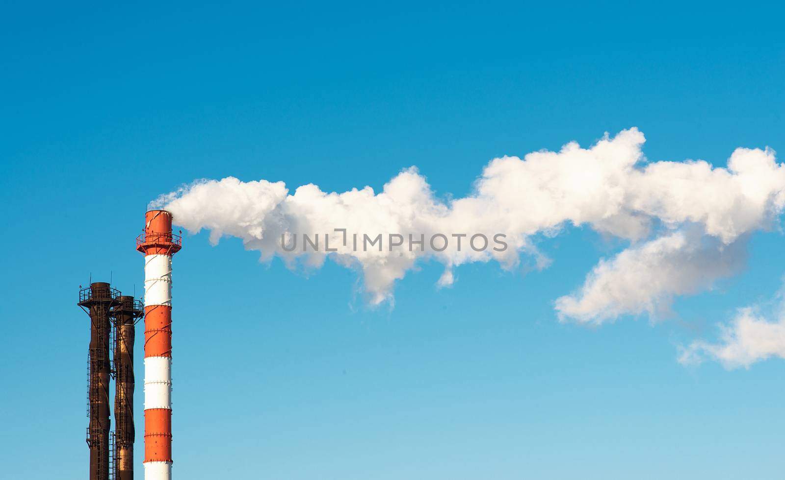  Atomic Power Station with blue sky and clouds, close up view