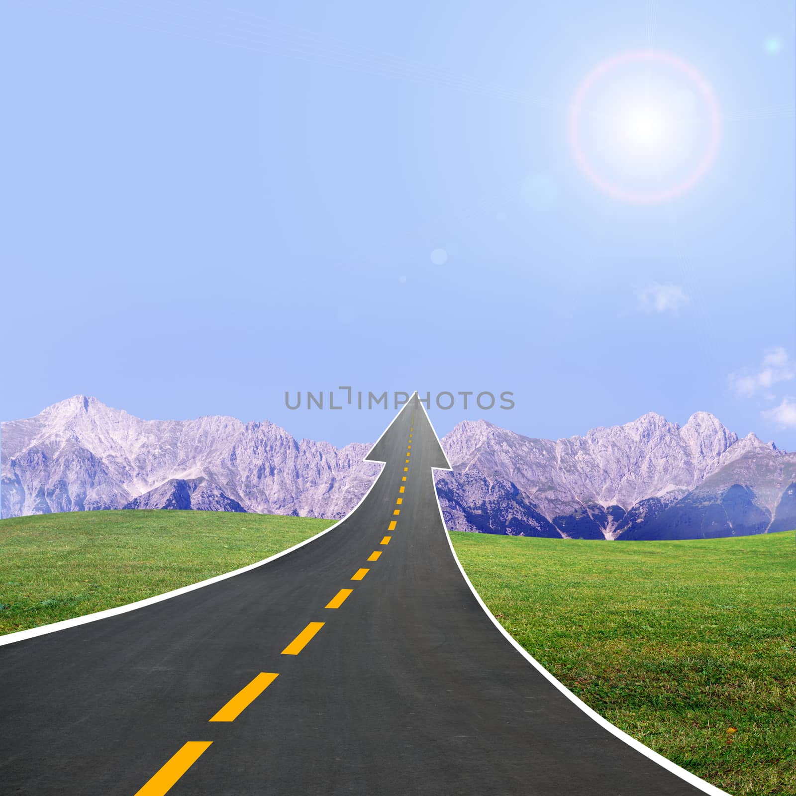 Highway road going up llike arrow in sky with mountains