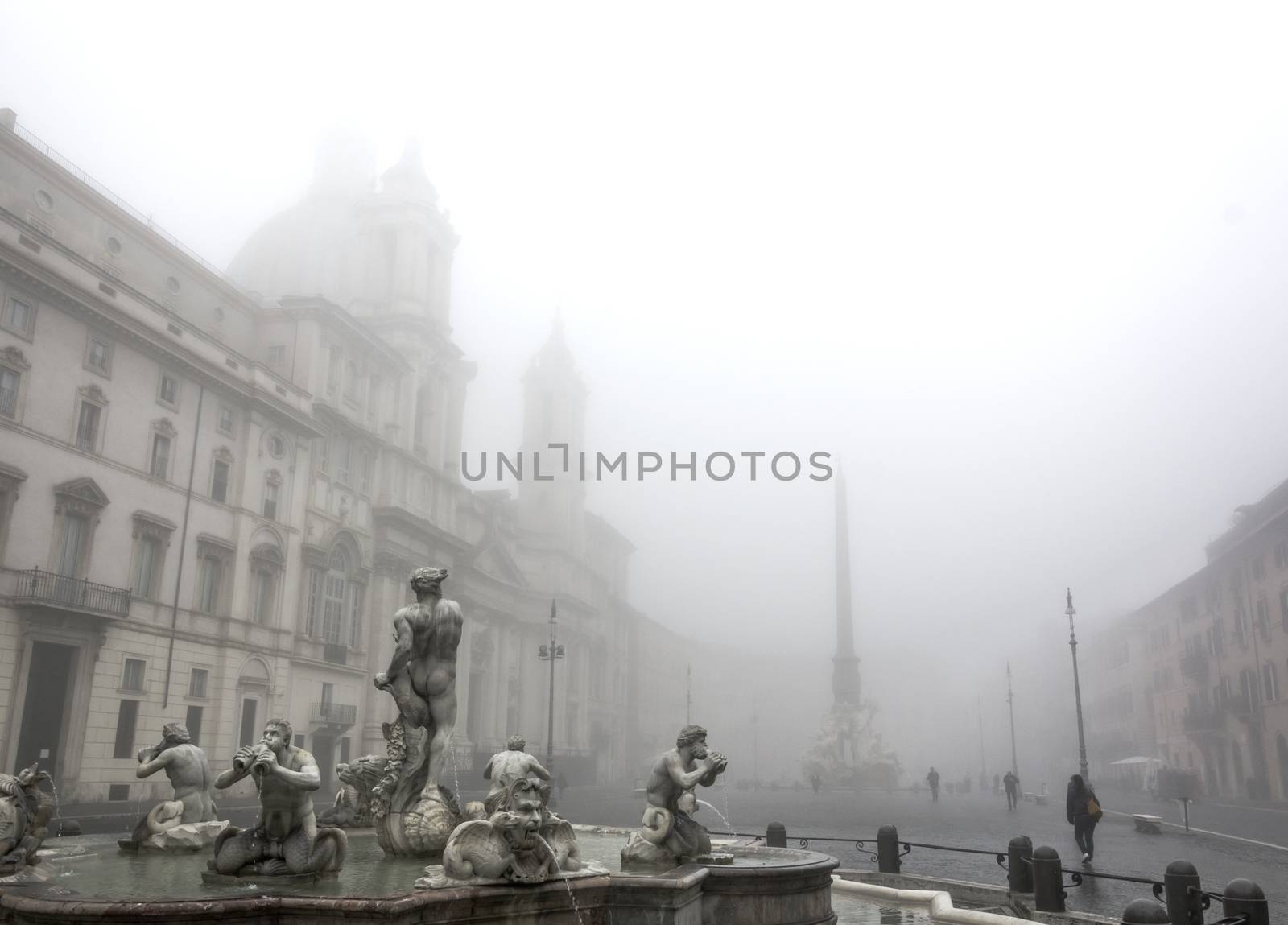 Rome, Italy, 28 jan 2016: Piazza Navona wrapped in an unusual fog