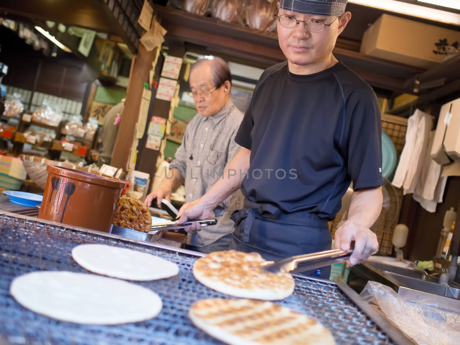 grilling senbei rice crackers by zkruger