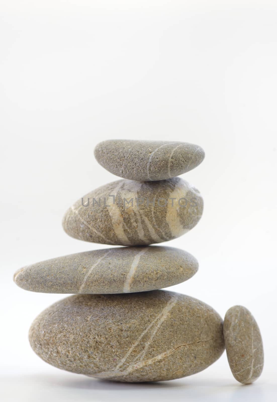 Pyramid of Stones isolated on white background