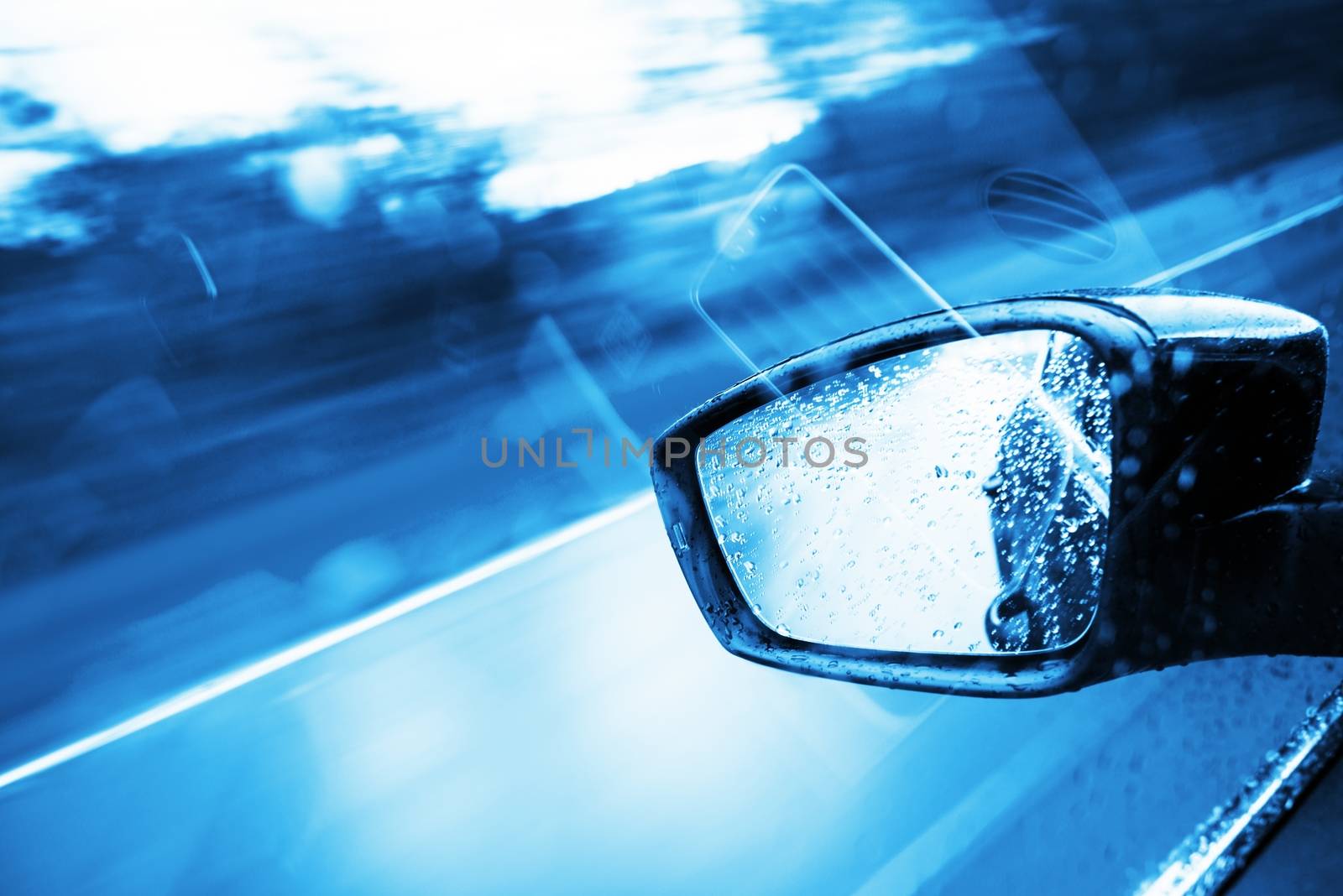 Driving Concept - Blue Color Grading. Modern Car Side Mirror.