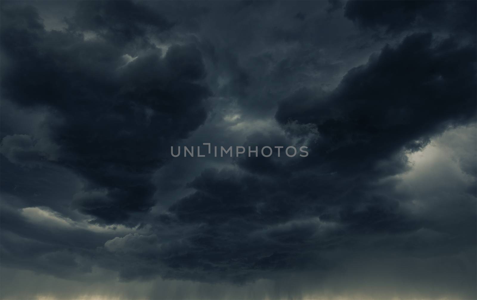 Heavy Dark Storm Cloud and the Falling Rain. Stormy Weather