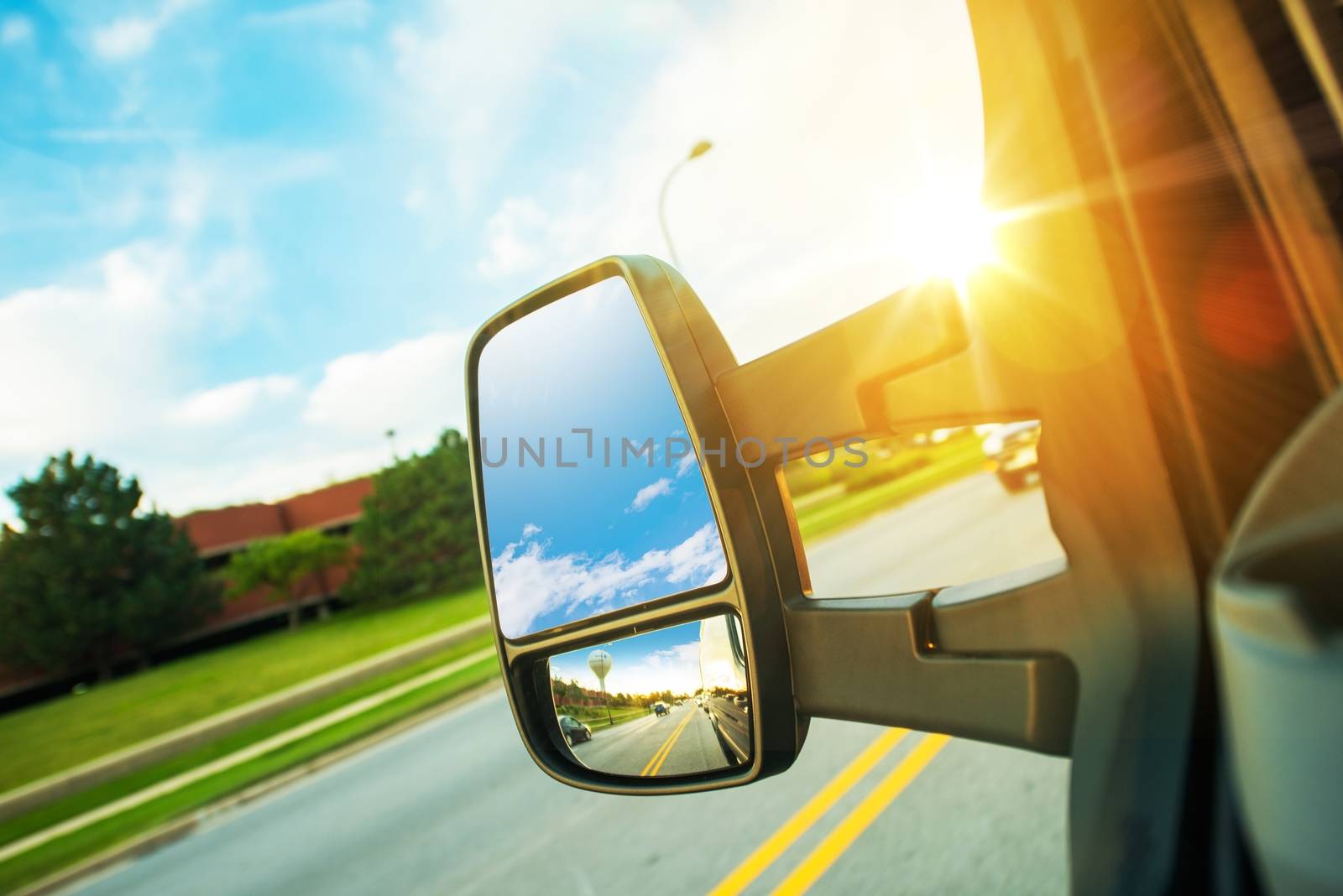 Cargo Van Driving Concept. Large Cargo Van Mirror. Van in Motion.